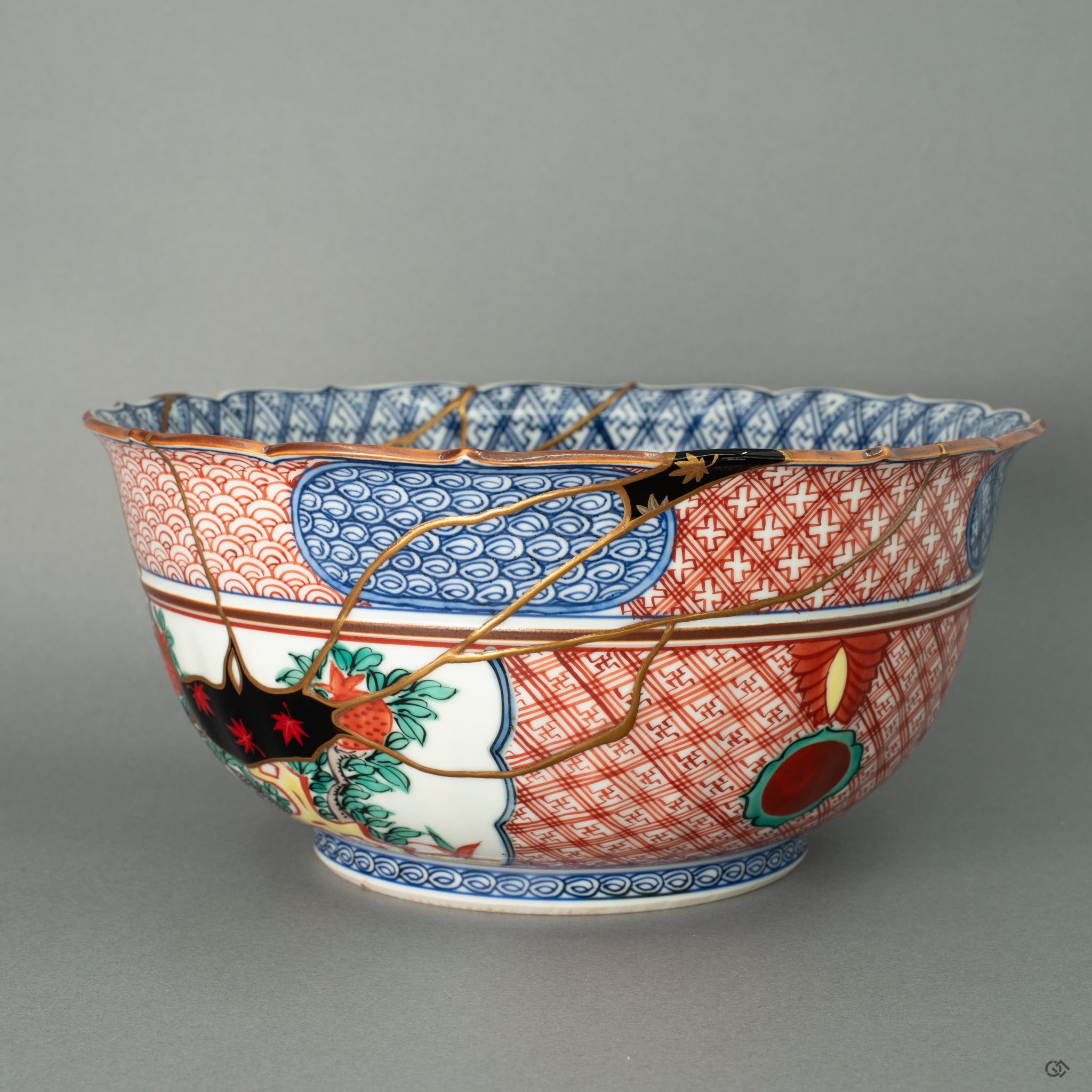 A macro view of the masterful Yobitsugi technique, where a carefully selected ceramic fragment is seamlessly integrated into the original Shonzui bowl. The gold Kintsugi line embraces both pieces, creating a new harmony and a dialogue between two separate histories.