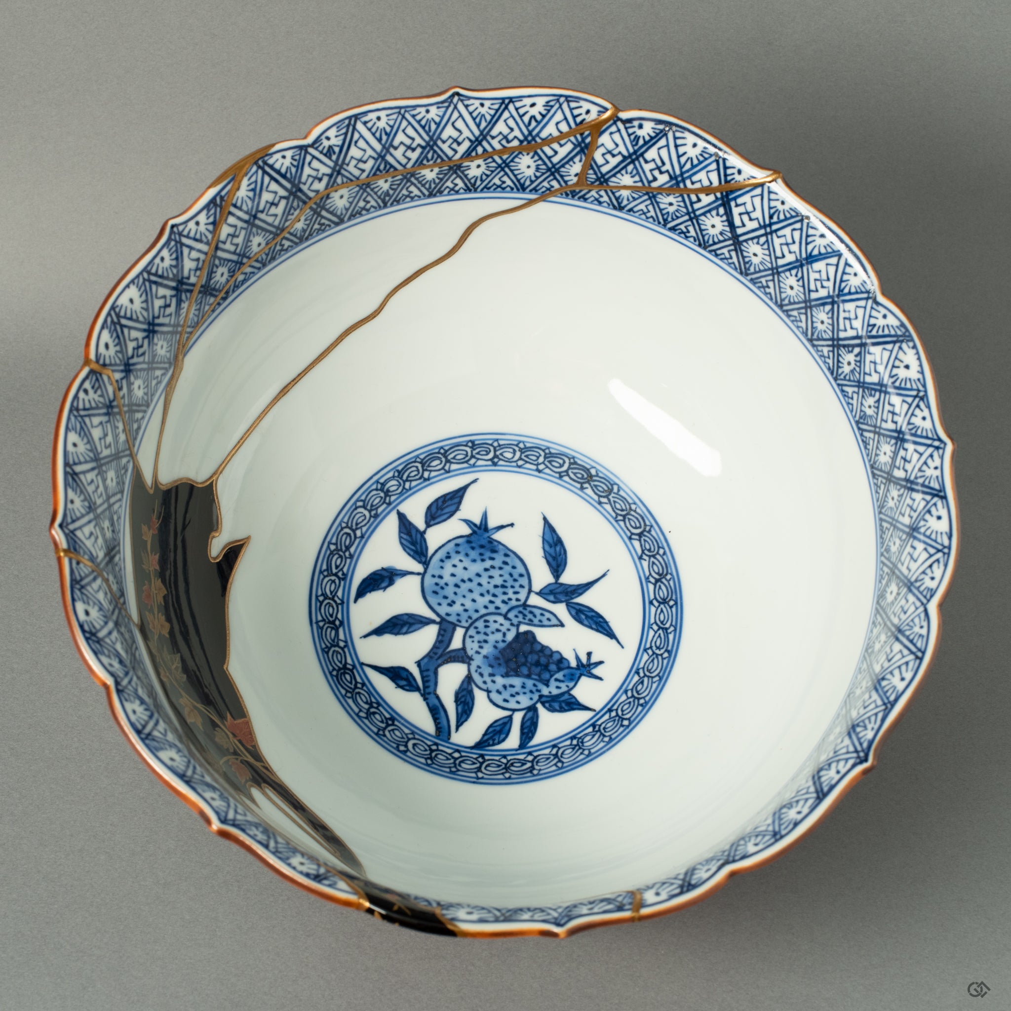 Looking into the vast interior of the Shonzui bowl, revealing the extensive and complex network of Kintsugi repairs, a testament to the vessel's dramatic history and magnificent rebirth.