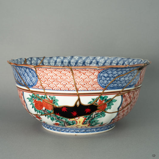 The monumental form of a Shonzui-patterned Kyoto ware bowl, resurrected over 6 months by a 40-year master artisan. This masterpiece fuses 24k gold, silver, and platinum Kintsugi with Maki-e, Urushi-e, and the rare art of Yobitsugi.