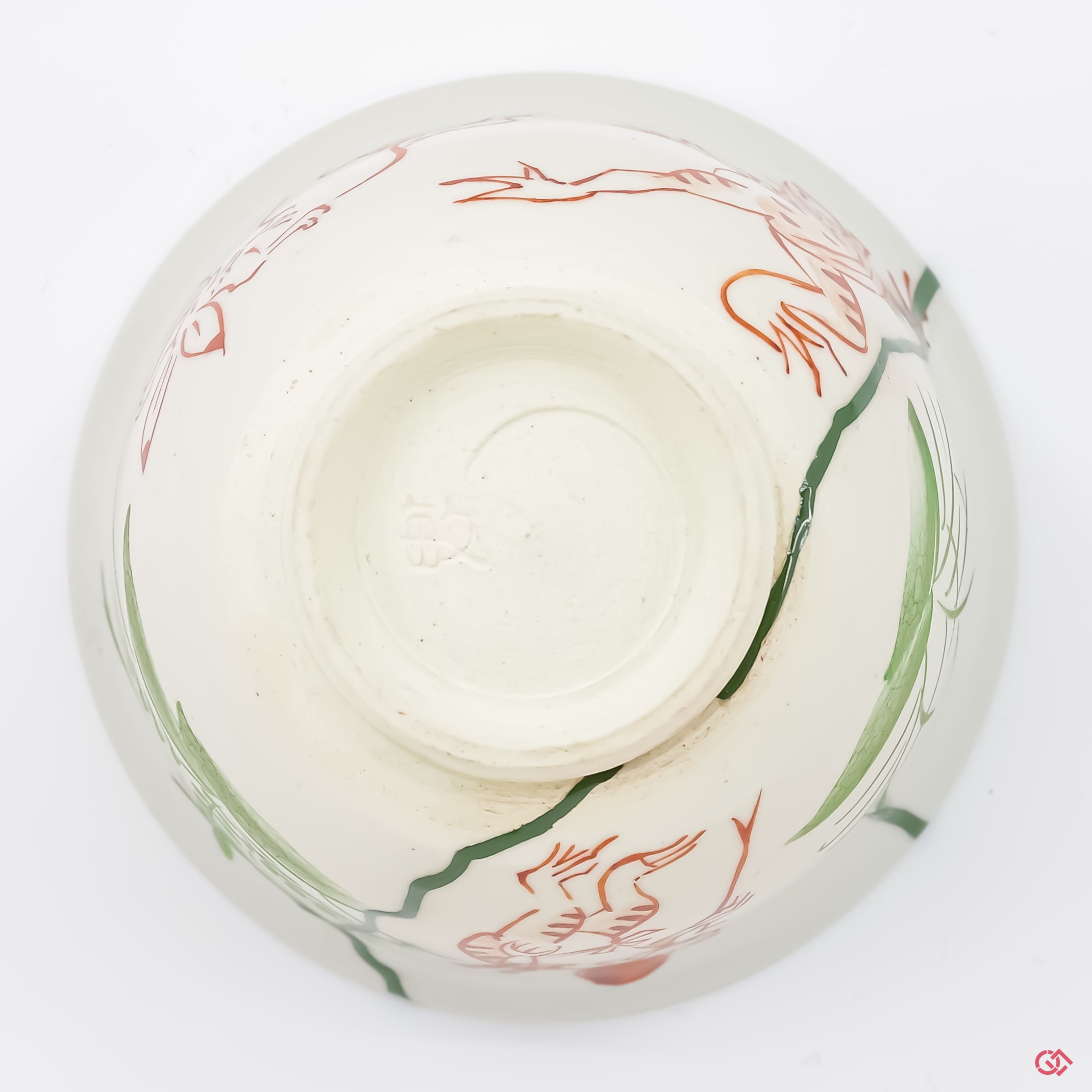 Photo of the bottom side of an authentic Kintsugi pottery, showing its overall design and features.