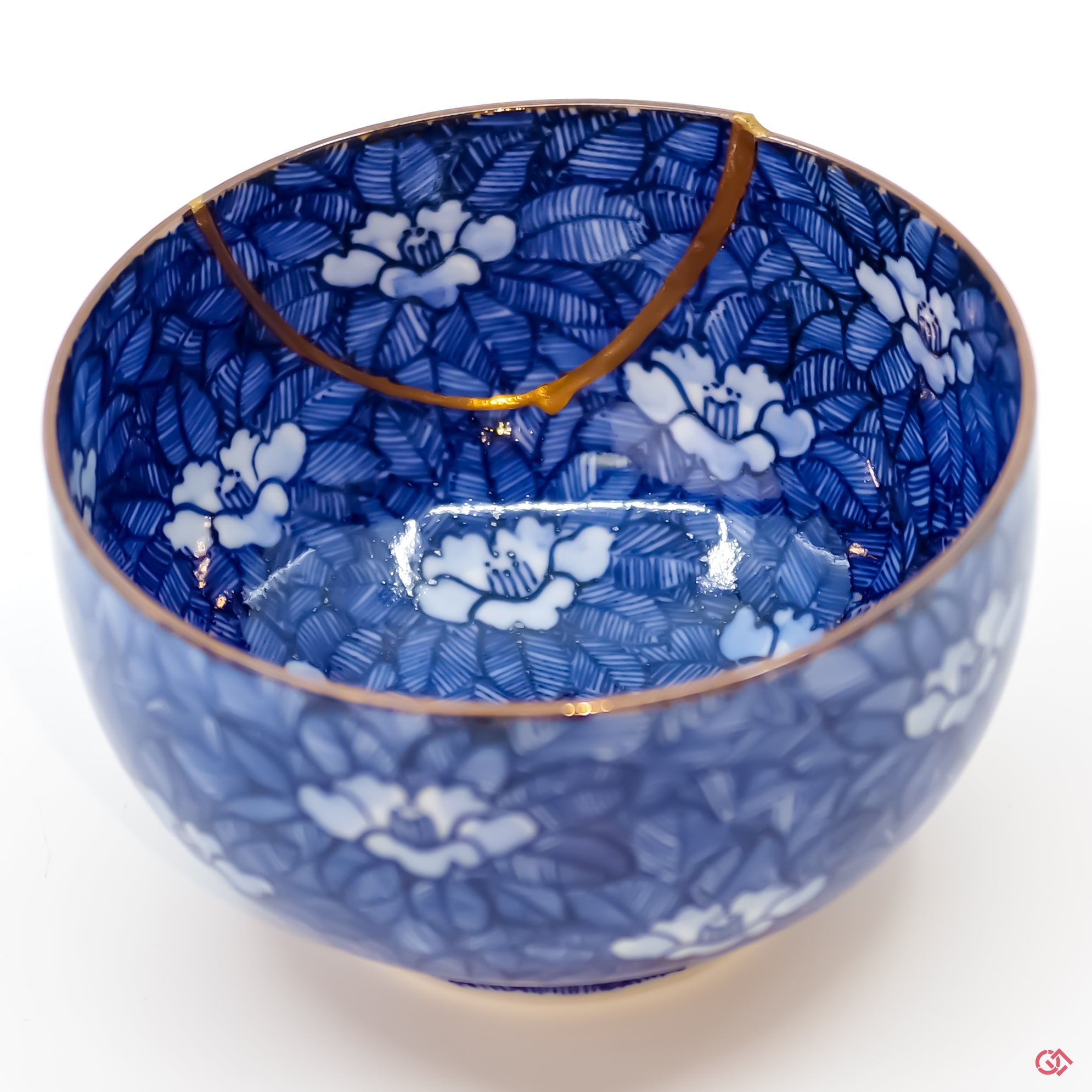Buy the Japanese art of Kintsugi up close: Witness the delicate brushstrokes of gold that transform imperfection into beauty.