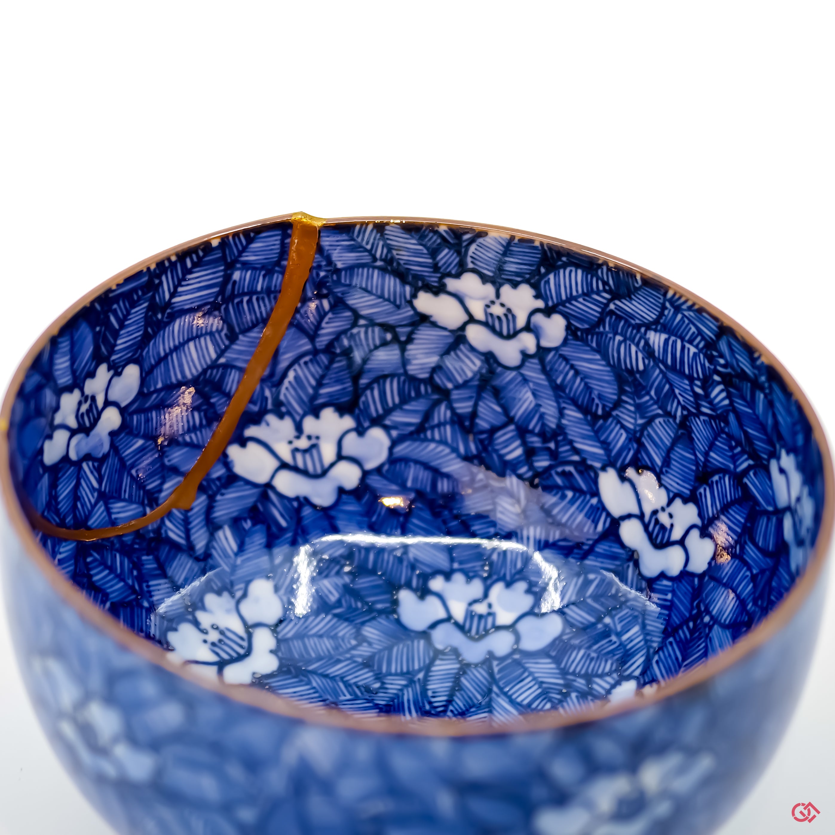 Buy the Japanese art of Kintsugi up close: Witness the delicate brushstrokes of gold that transform imperfection into beauty.