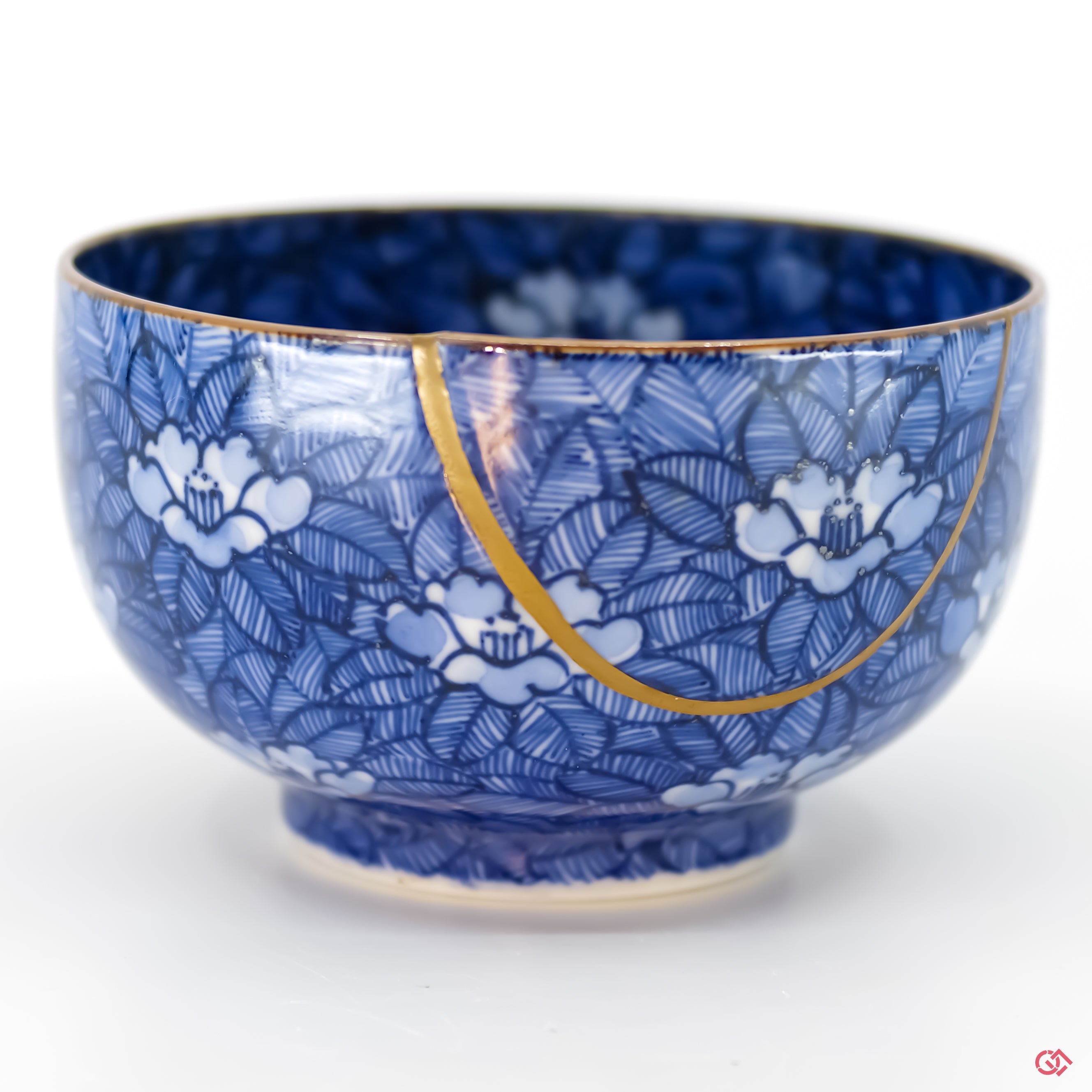 Buy the Japanese art of Kintsugi up close: Witness the delicate brushstrokes of gold that transform imperfection into beauty.