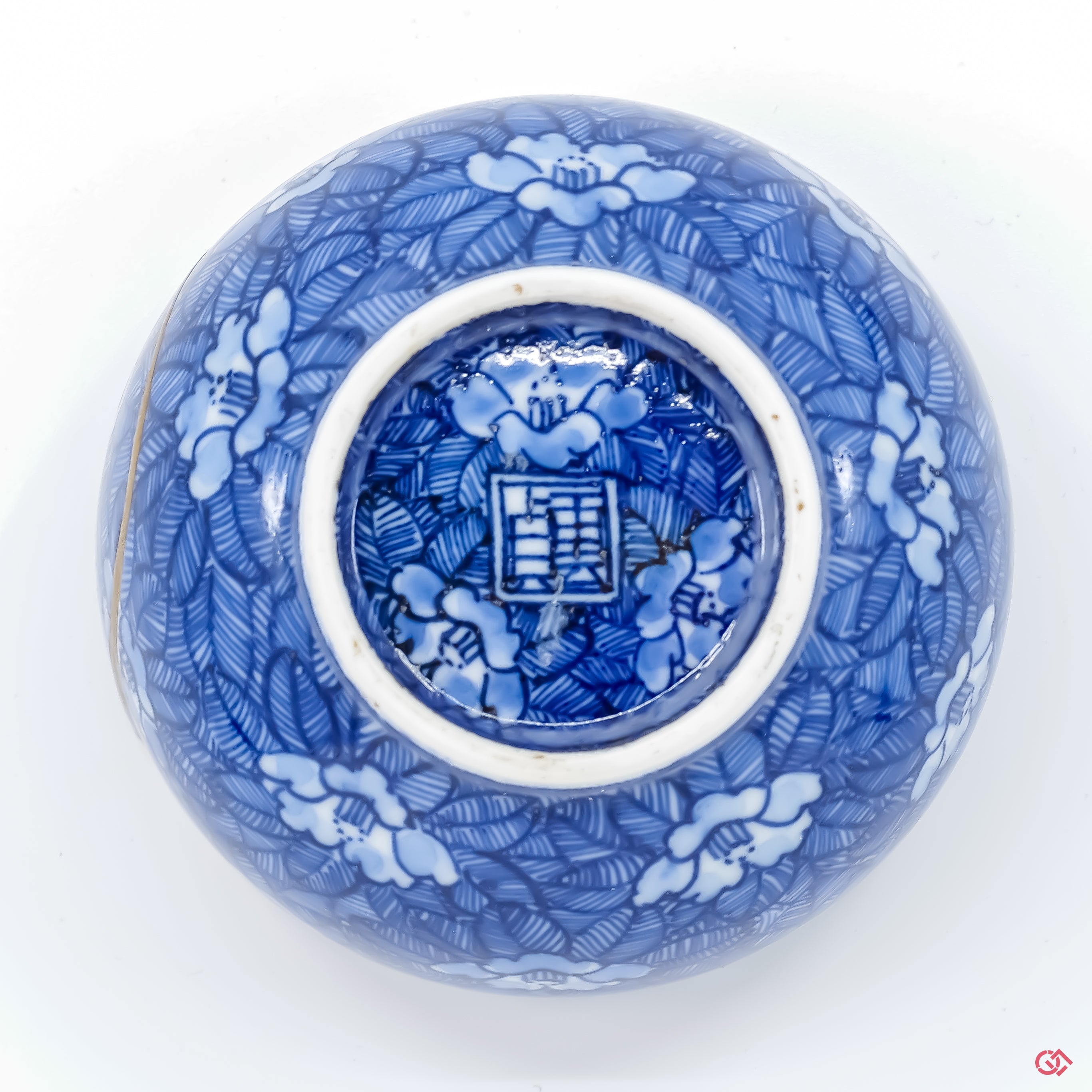 Photo of the bottom side of an authentic Kintsugi pottery, showing its overall design and features
