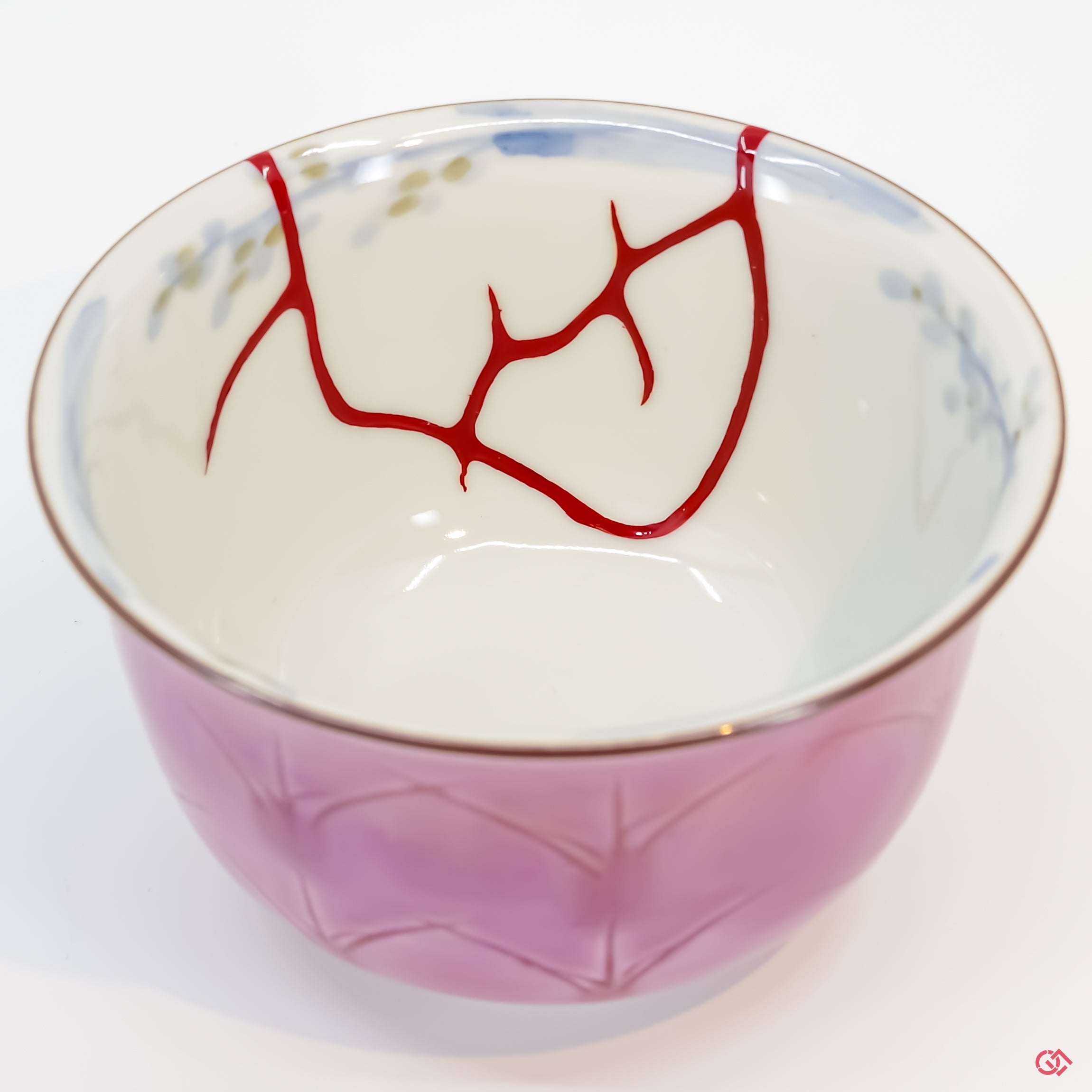 Buy the Japanese art of Kintsugi up close: Witness the delicate brushstrokes of gold that transform imperfection into beauty.
