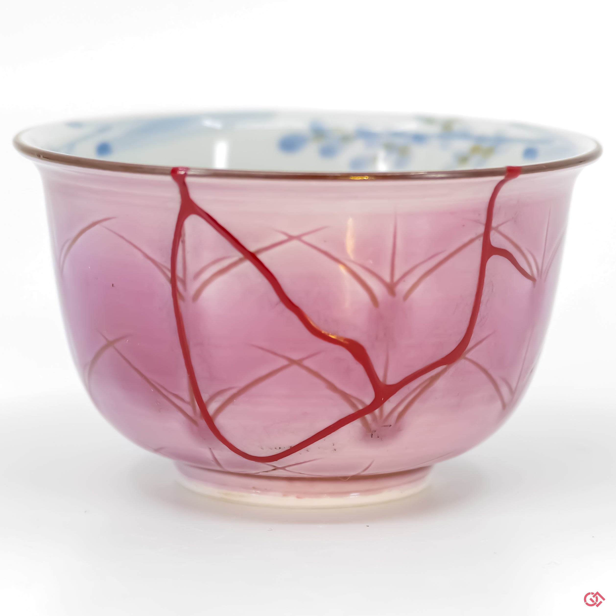 Buy the Japanese art of Kintsugi up close: Witness the delicate brushstrokes of gold that transform imperfection into beauty.