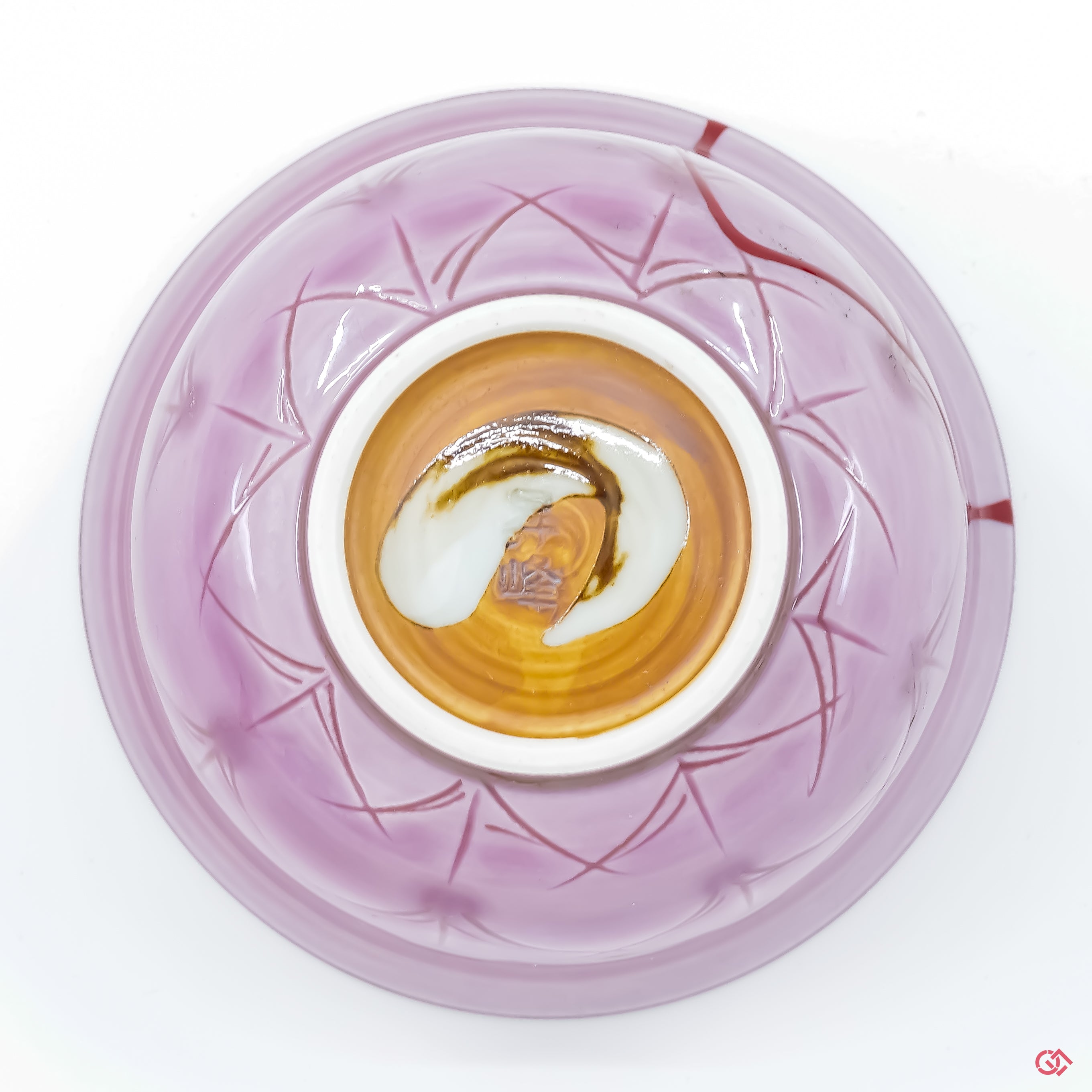 Photo of the bottom side of an authentic Kintsugi pottery, showing its overall design and features.