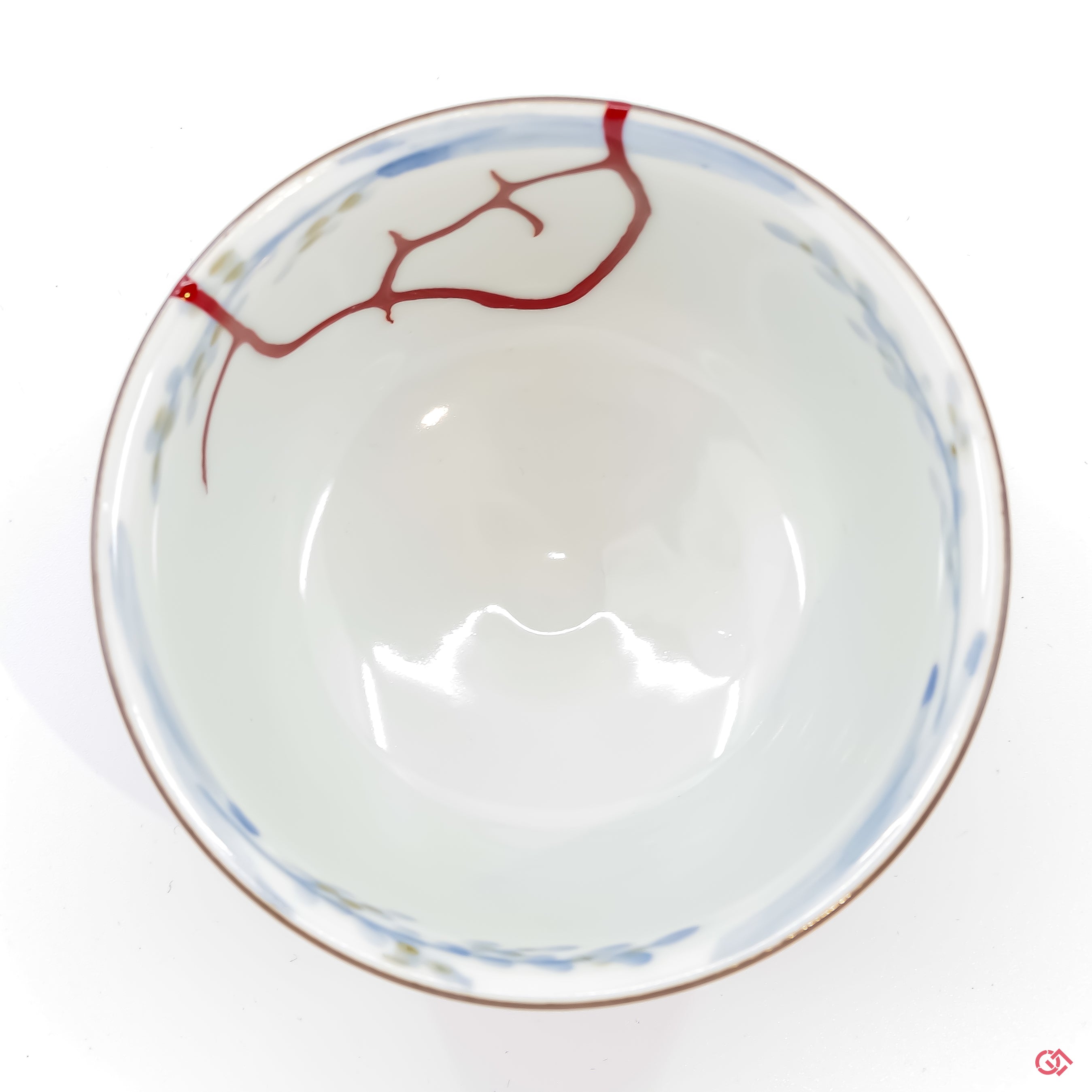 Photo of the top side of an authentic Kintsugi pottery, showing its overall design and features.