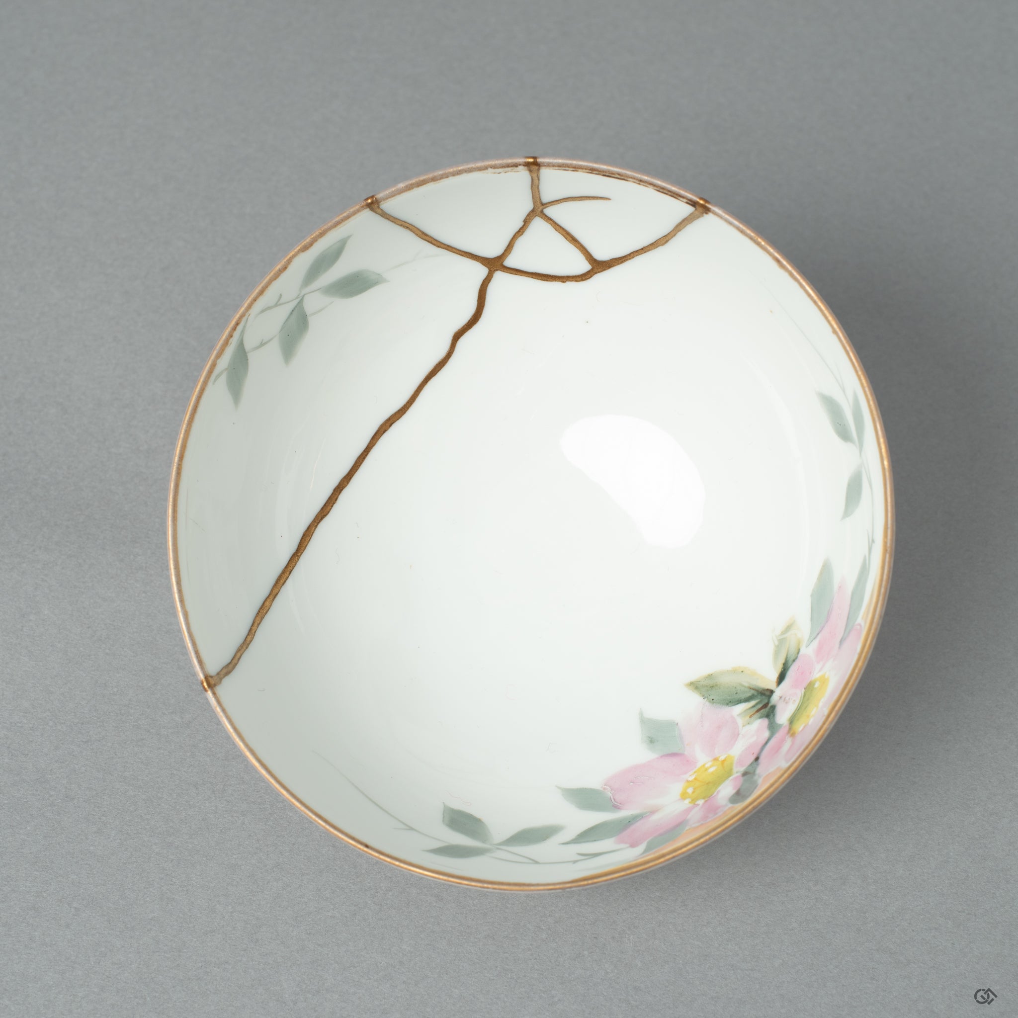 Top-down view into the Early Noritake kintsugi cup, its golden seams offering a moment of contemplation' on the beauty of a second life.