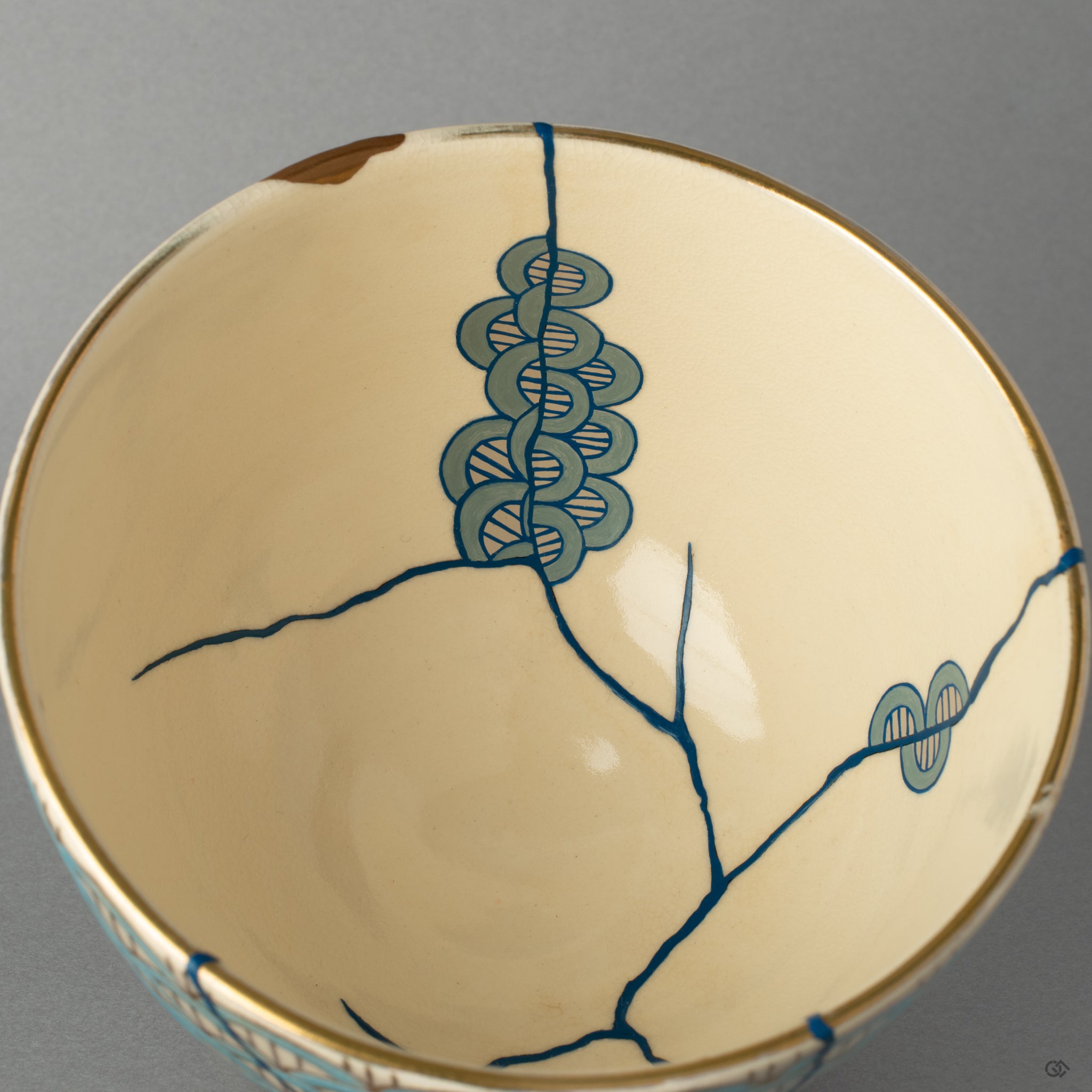 A detail close-up of the bowls golden seams, each one a unique story in every seam, showcasing the art of Urushi lacquer and 24K gold.