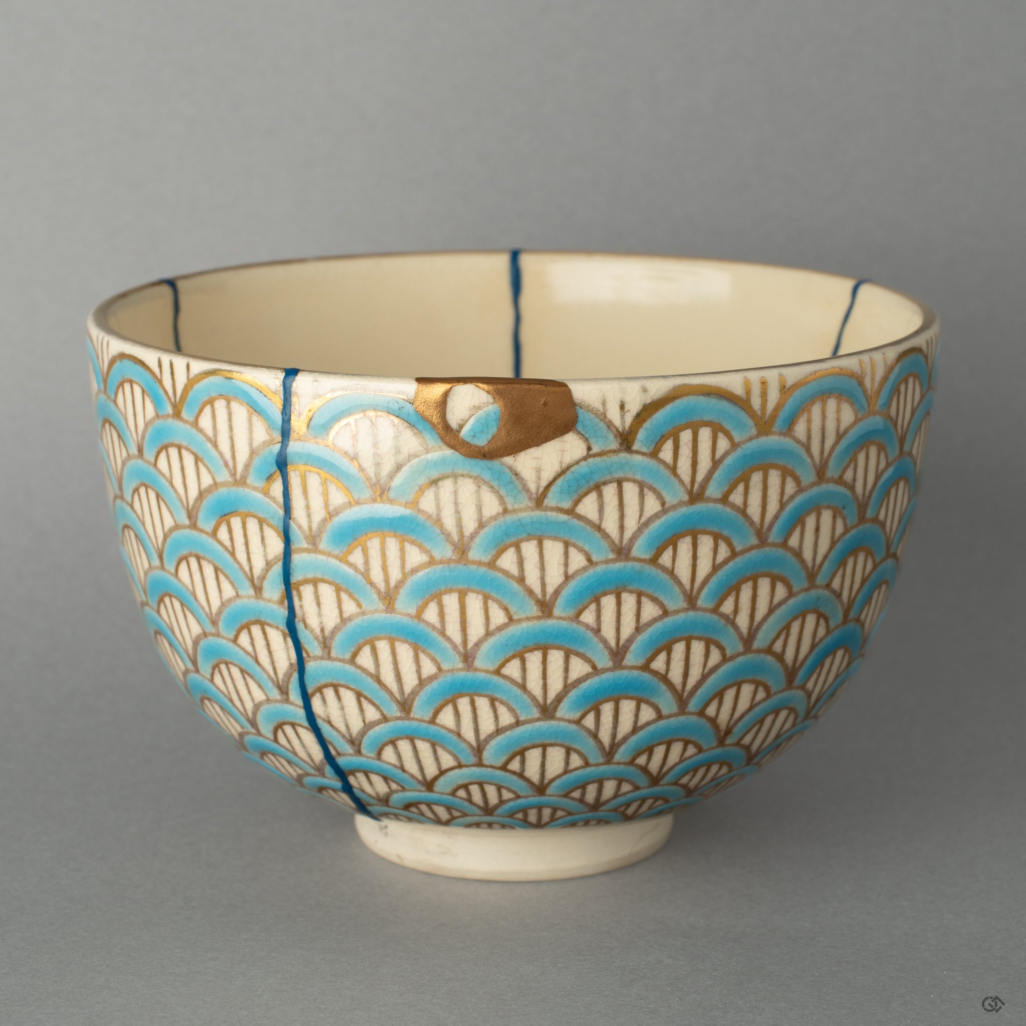 Full view of a Kyoto ware matcha bowl mended with radiant gold Kintsugi, an embodiment of resilience made beautiful.