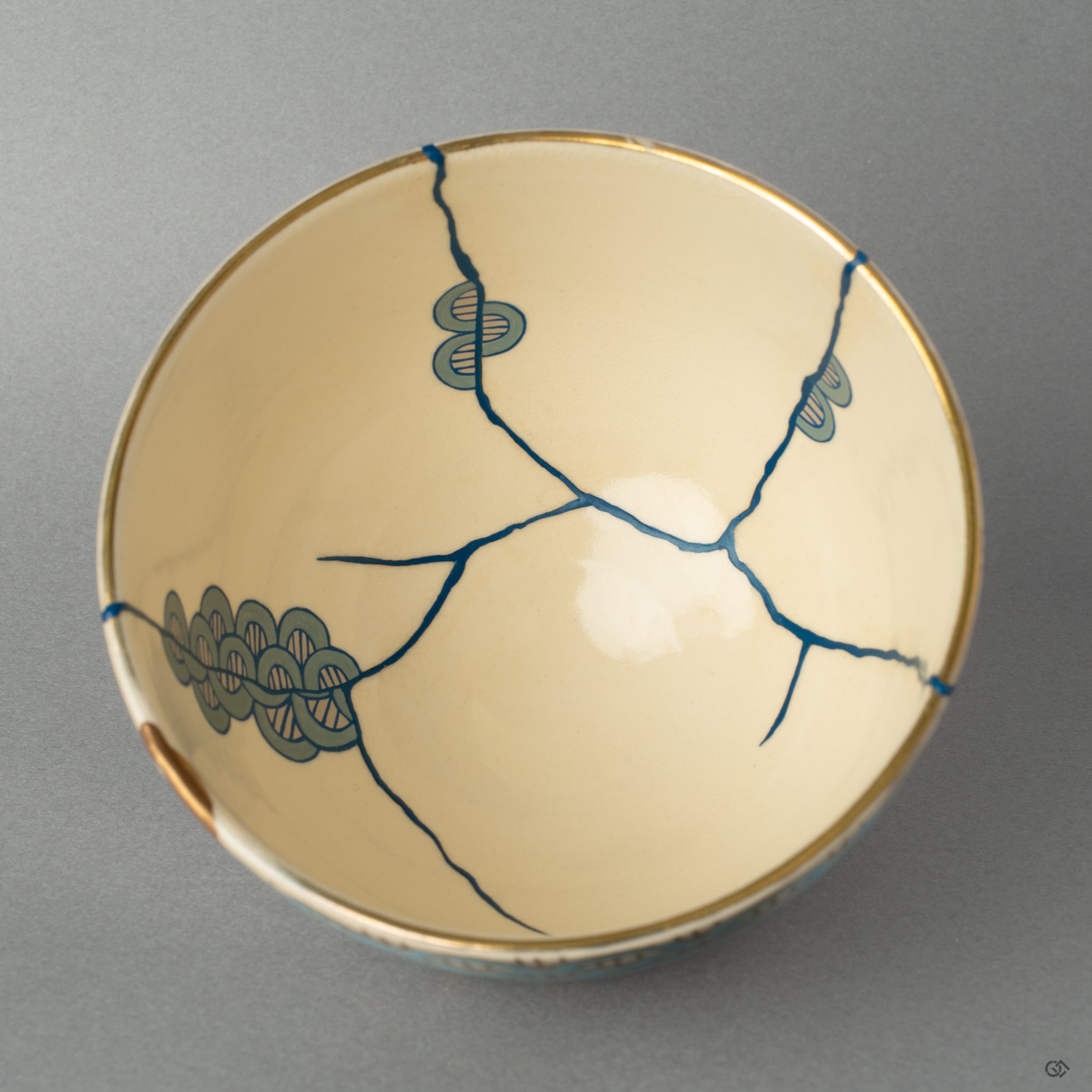 Top-down view of the matcha bowl, its perfectly imperfect surface telling a new story to tell through golden joinery.