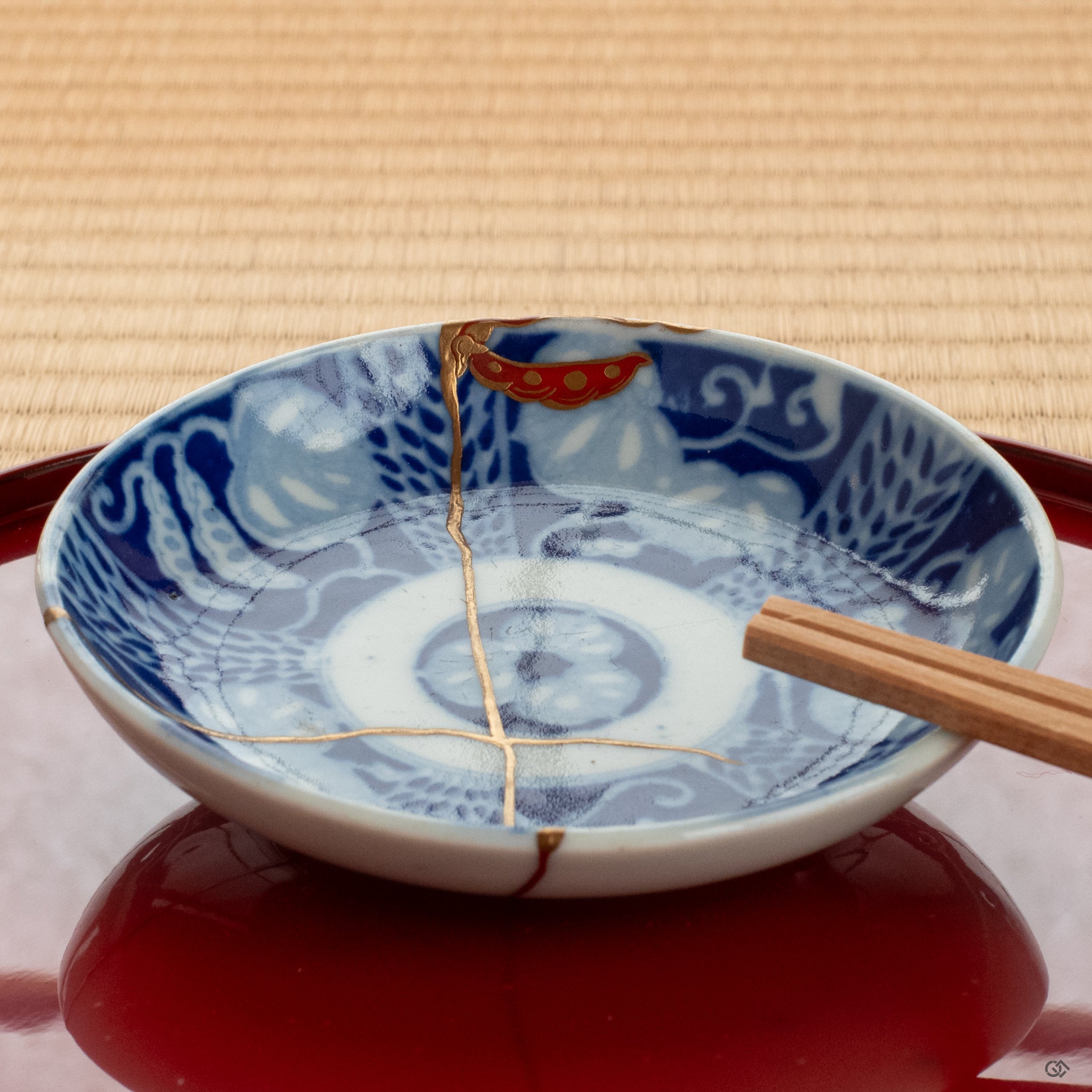 An authentic kintsugi small dish used for presentation, embodying intentional living and the wabi-sabi philosophy of beauty in imperfection.