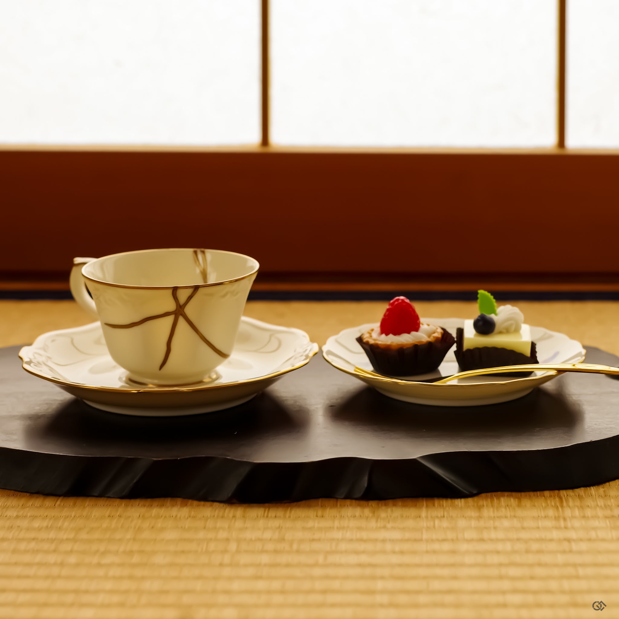 An authentic Japanese Kintsugi Cup & Saucer repaired with 24K Gold artistry, revealing the harmony between the original form and its golden seams.