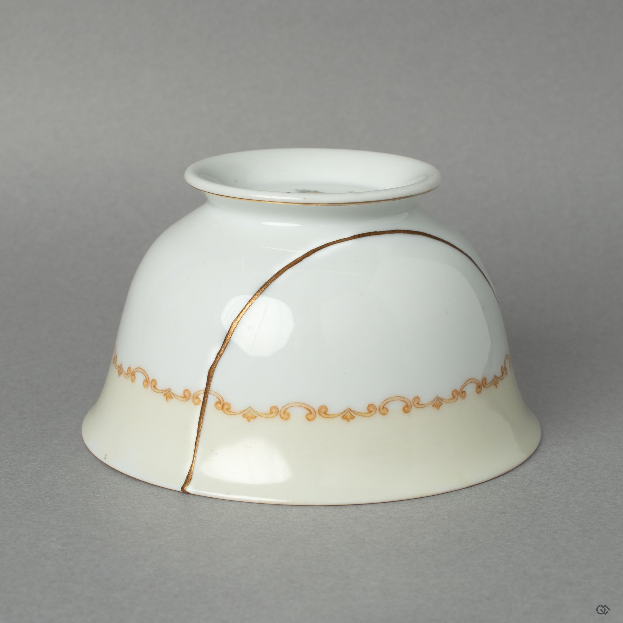 A different side view of the Early Noritake cup, its graceful kintsugi mend an act of honoring history and its journey through time.