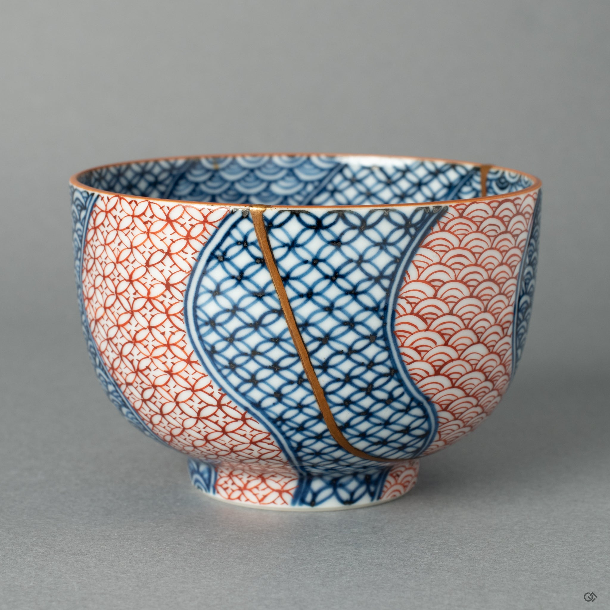 Close-up image revealing the artistry of 24k gold Kintsugi applied to a hand-crafted Kyoto ware tea cup.