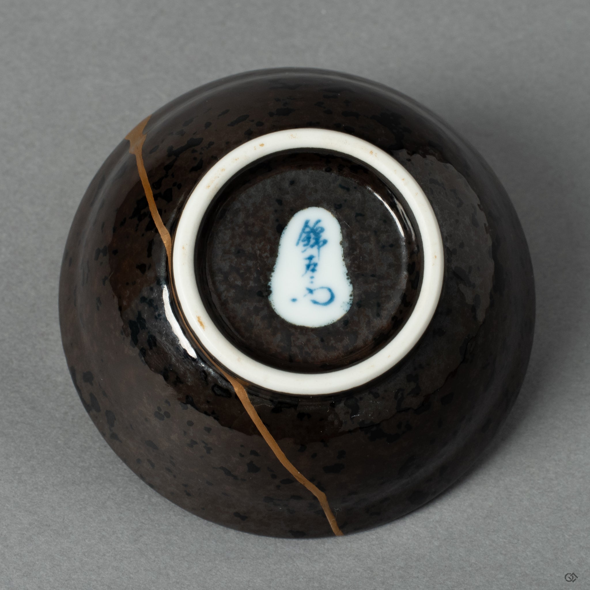 The foot and makers mark on the base of the Arita ware cup, a signature of the authentic Japanese craftsmanship that began its story.