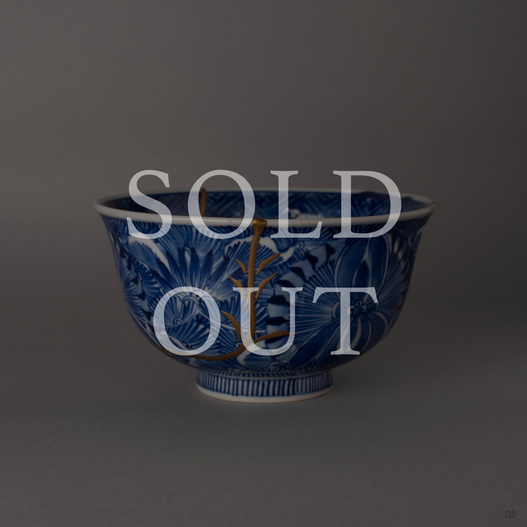 Sold out: Ko-Imari kintsugi bowl with 24K gold and maki-e restoration over sometsuke blue botanical porcelain.