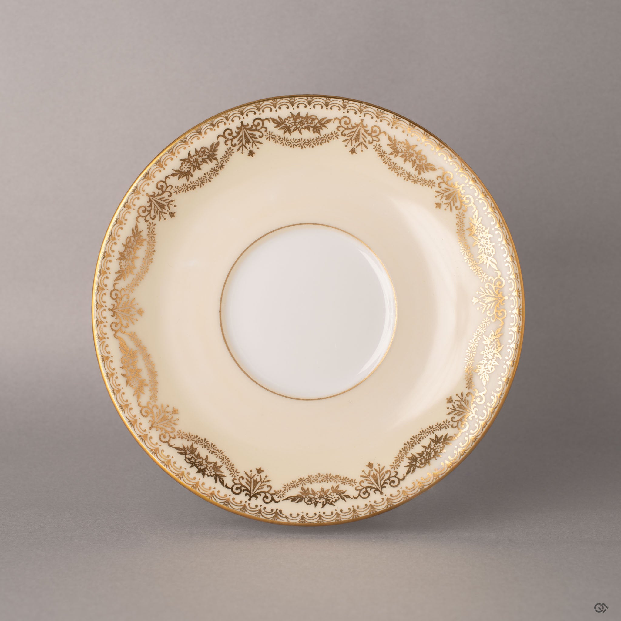 Hand-painted gold florals encircle this Noritake kintsugi saucer, Art Deco elegance preserved through time.