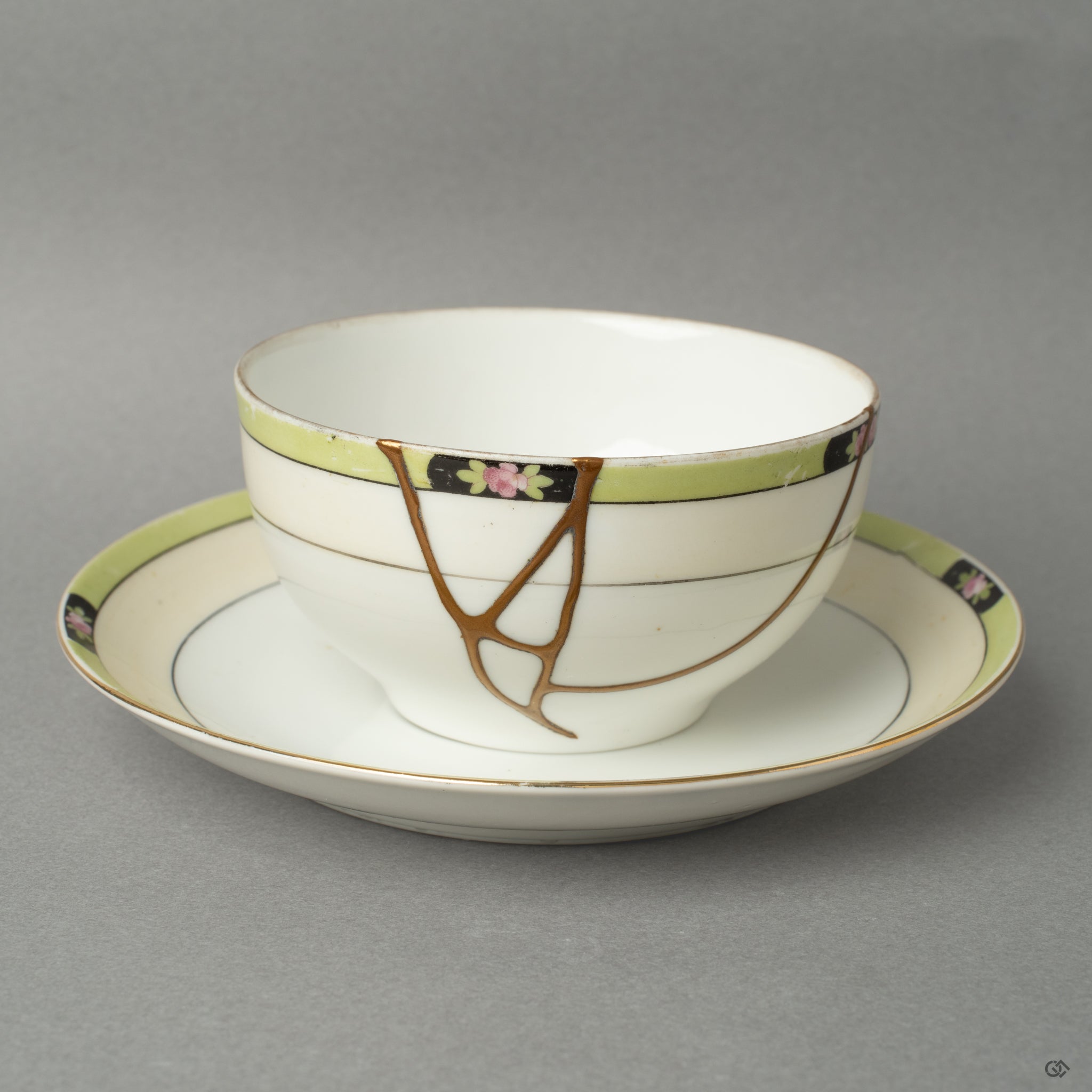 Front view of a Noritake kintsugi cup and saucer, restored with 24K gold—an enduring symbol of resilience made beautiful.