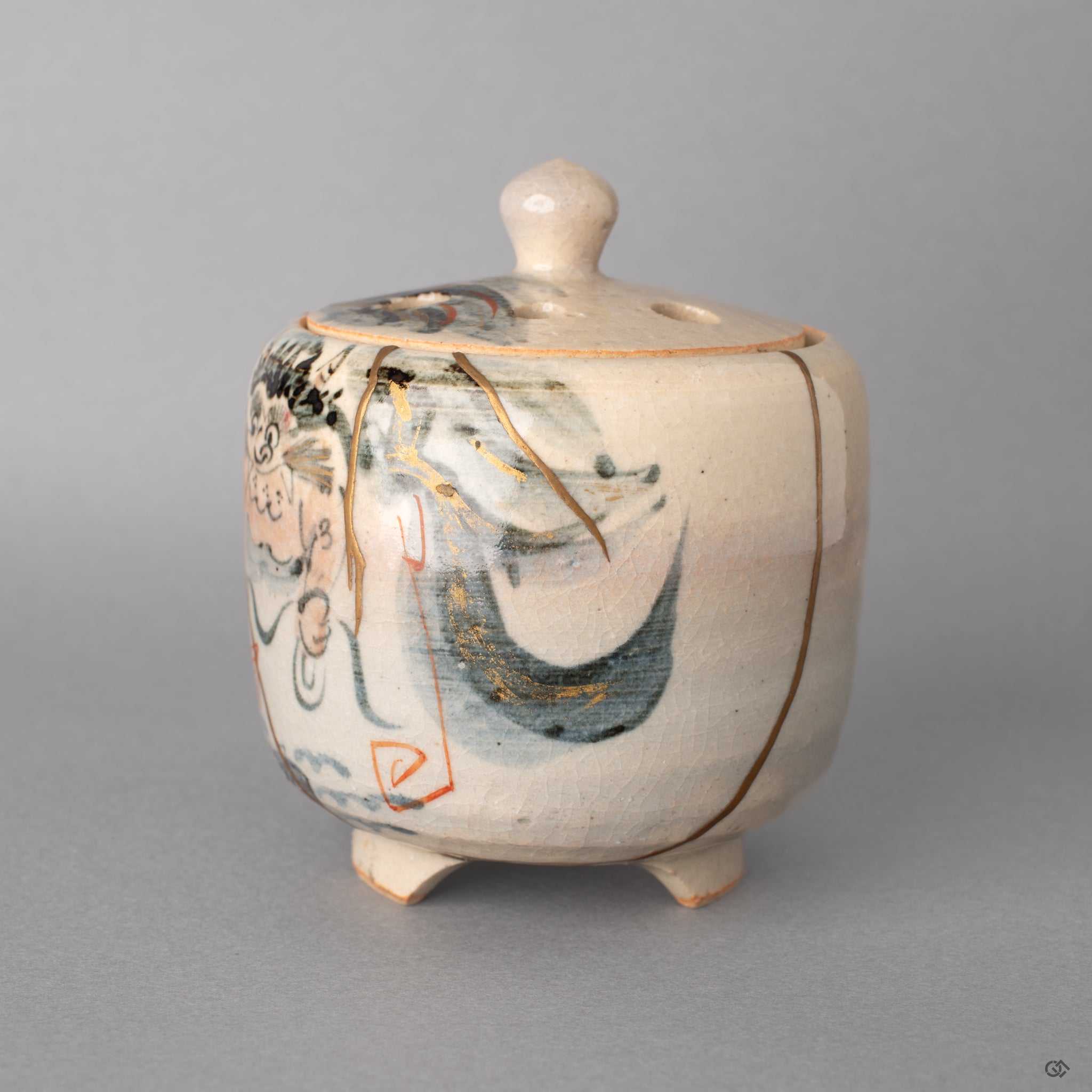 Alternate view of the Kyoto kintsugi incense burner. Gold meets the gray clay embodying crafted resilience in a quiet form.