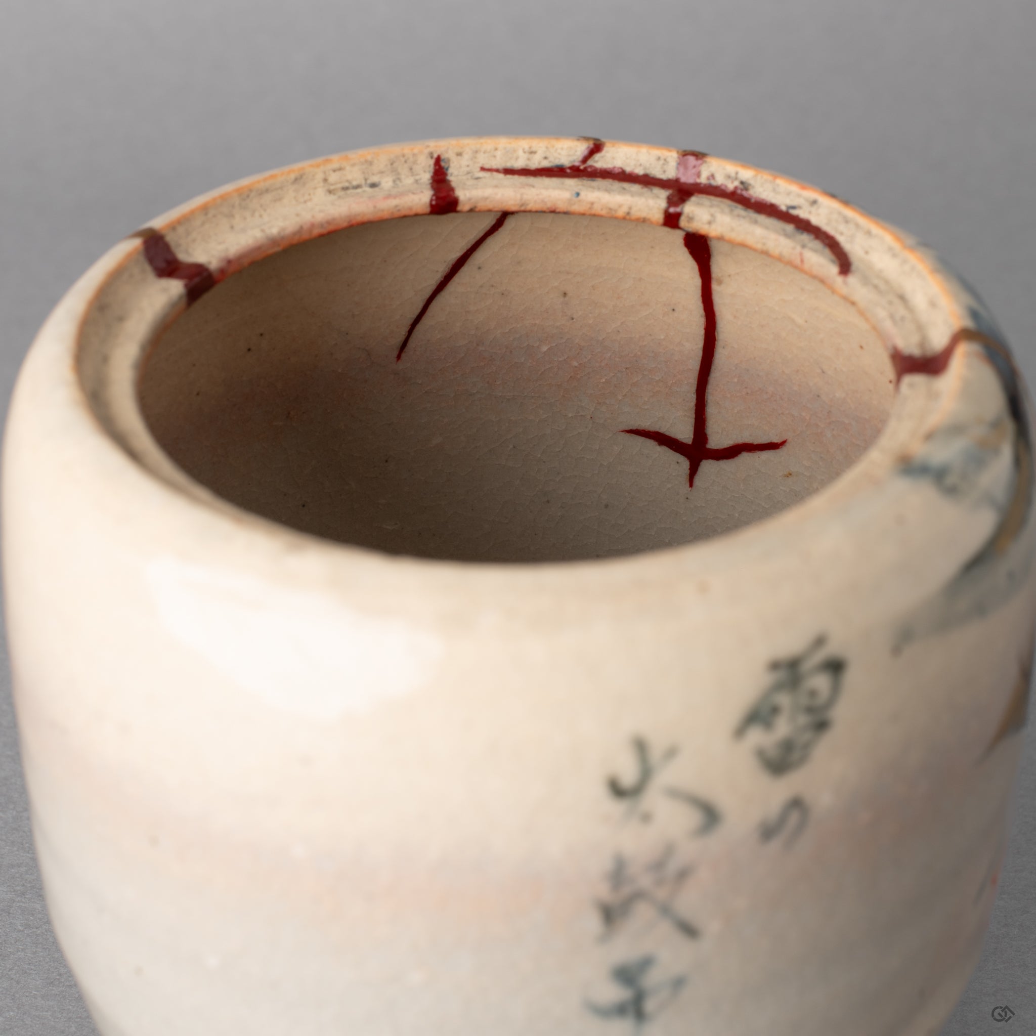 Vermillion urushi detail inside the kintsugi incense burner where heritage luxury meets slow craft.