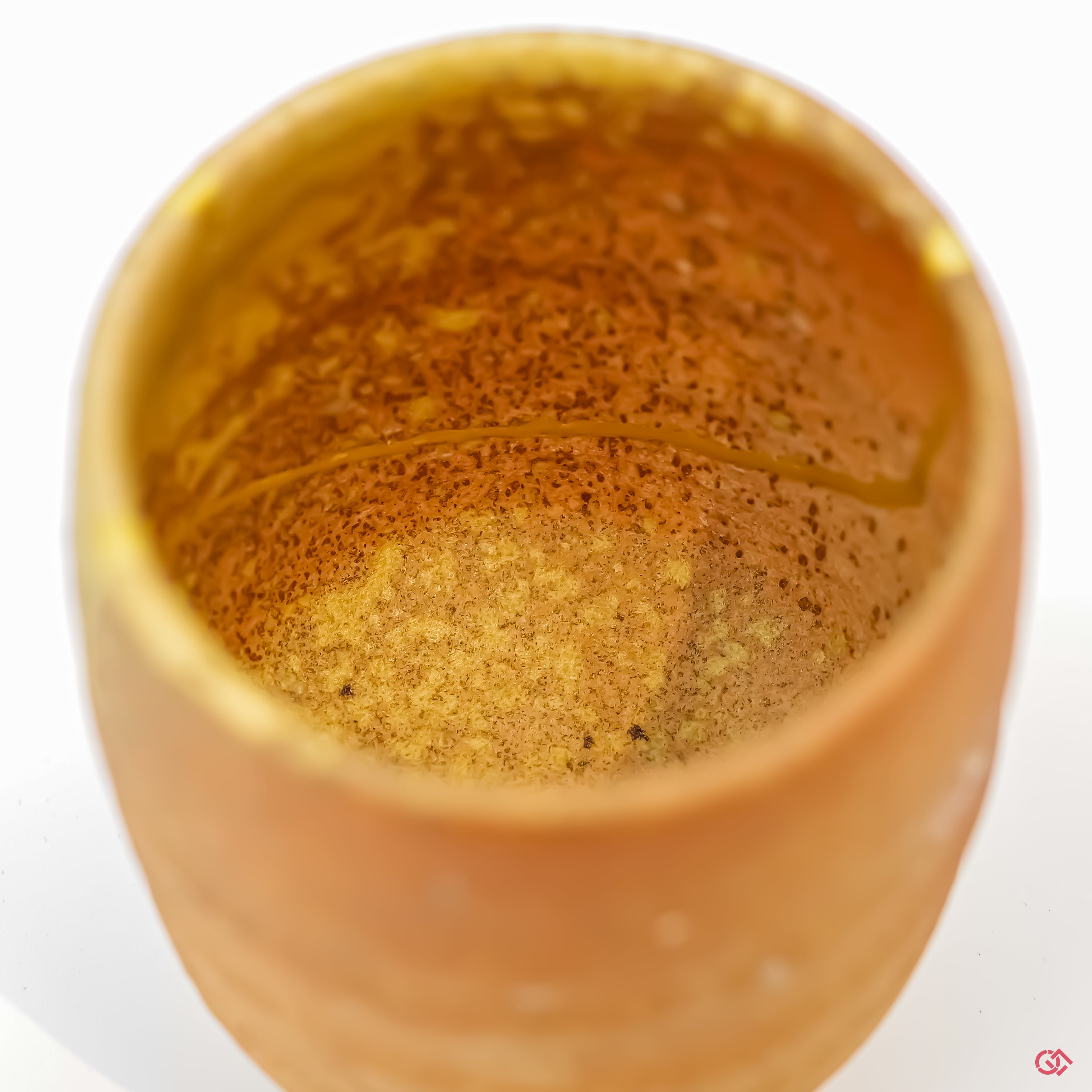 Close-up photo of an authentic Kintsugi pottery, showing the detail of its repairs and craftsmanship.