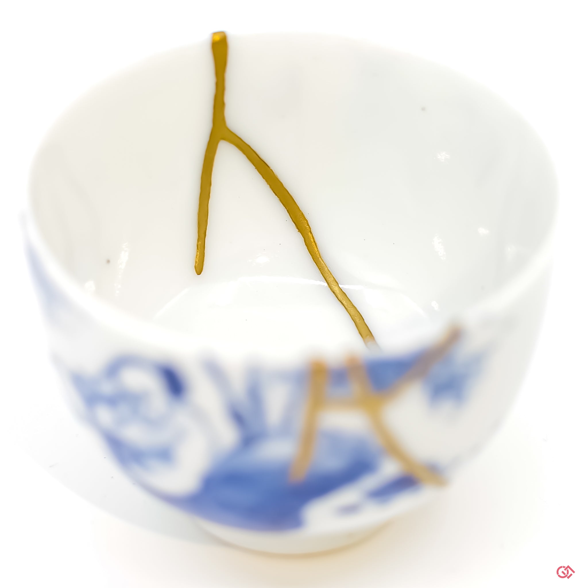 Detailed view of gold-laced Kintsugi, capturing the quiet elegance and profound beauty of Wabi-Sabi.