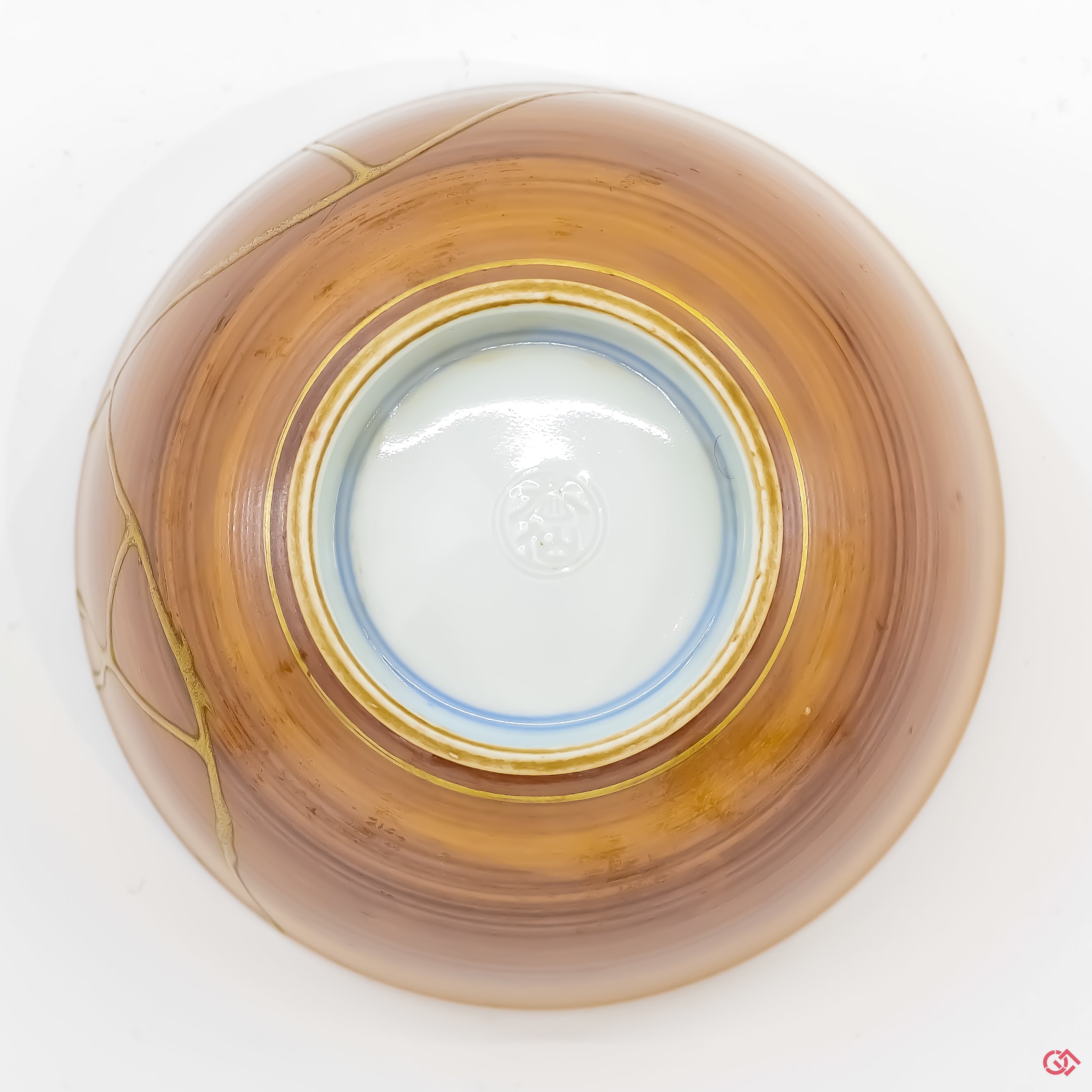 Photo of the bottom side of an authentic Kintsugi pottery, showing its overall design and features