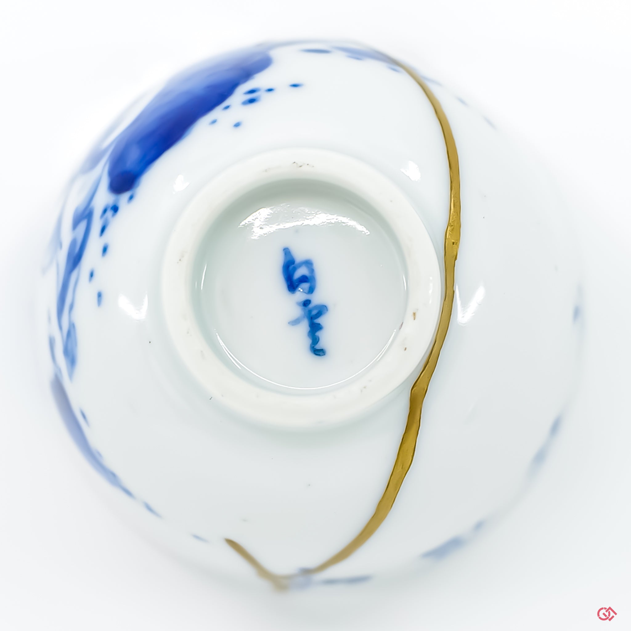 Explore the artistry of authentic Kintsugi: Top view of unique, repaired pottery.