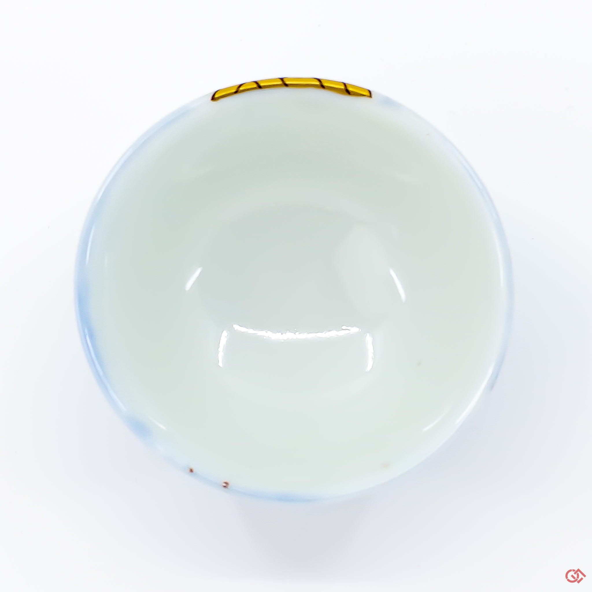 Photo of the top side of an authentic Kintsugi pottery piece, showing its overall design and features