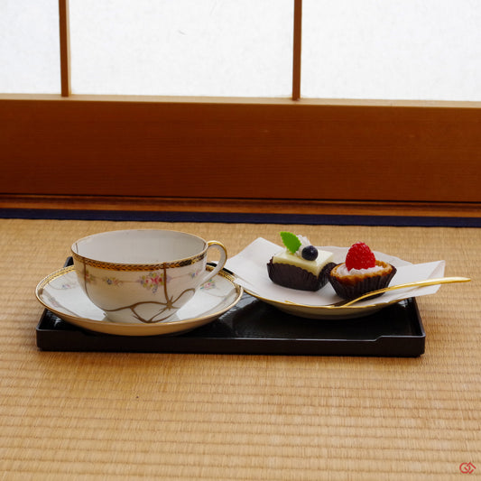 Photo of an authentic Kintsugi pottery piece being used in a real-world setting