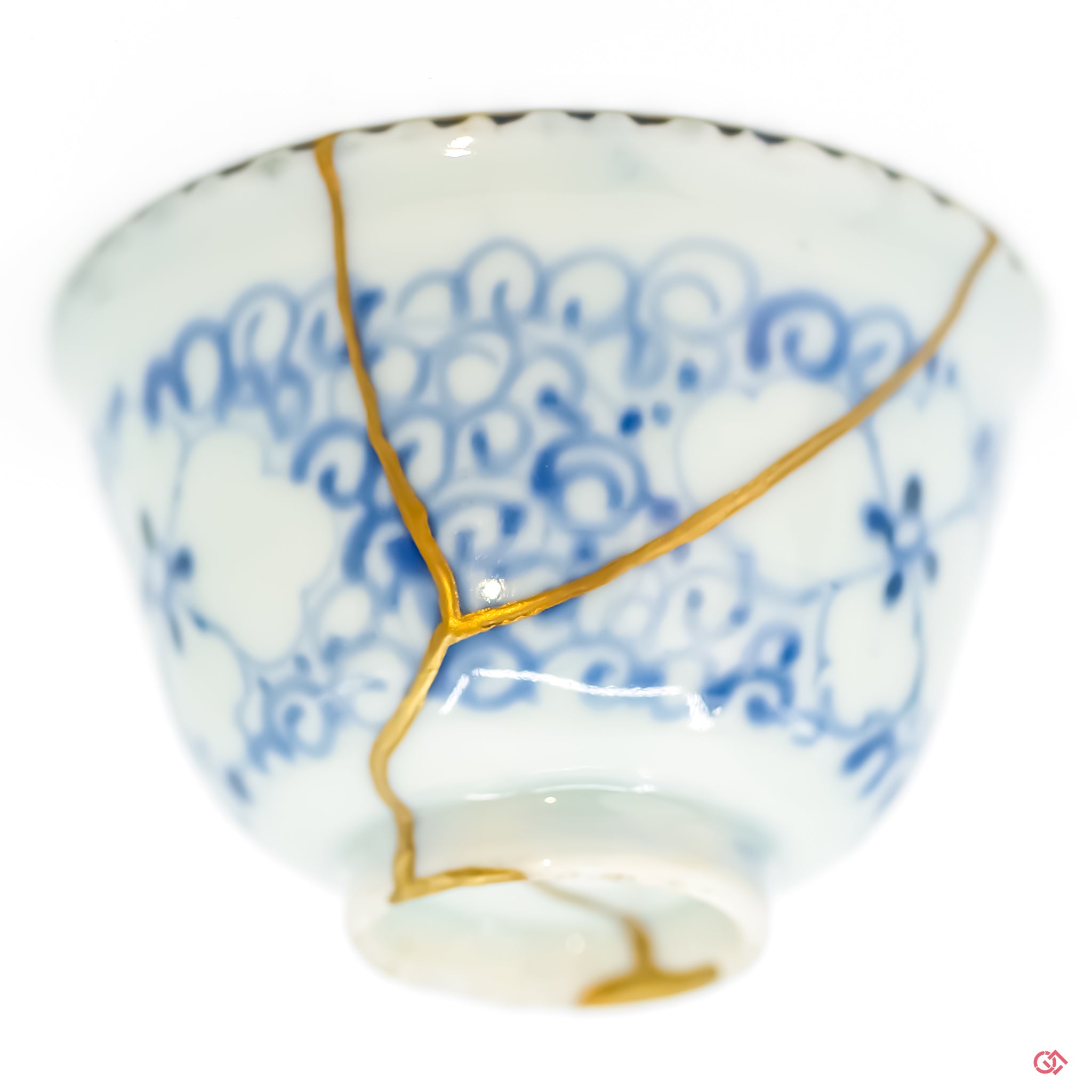 Detail of urushi lacquer and gold powder in a traditional Kintsugi repair, highlighting the craftsmanship.