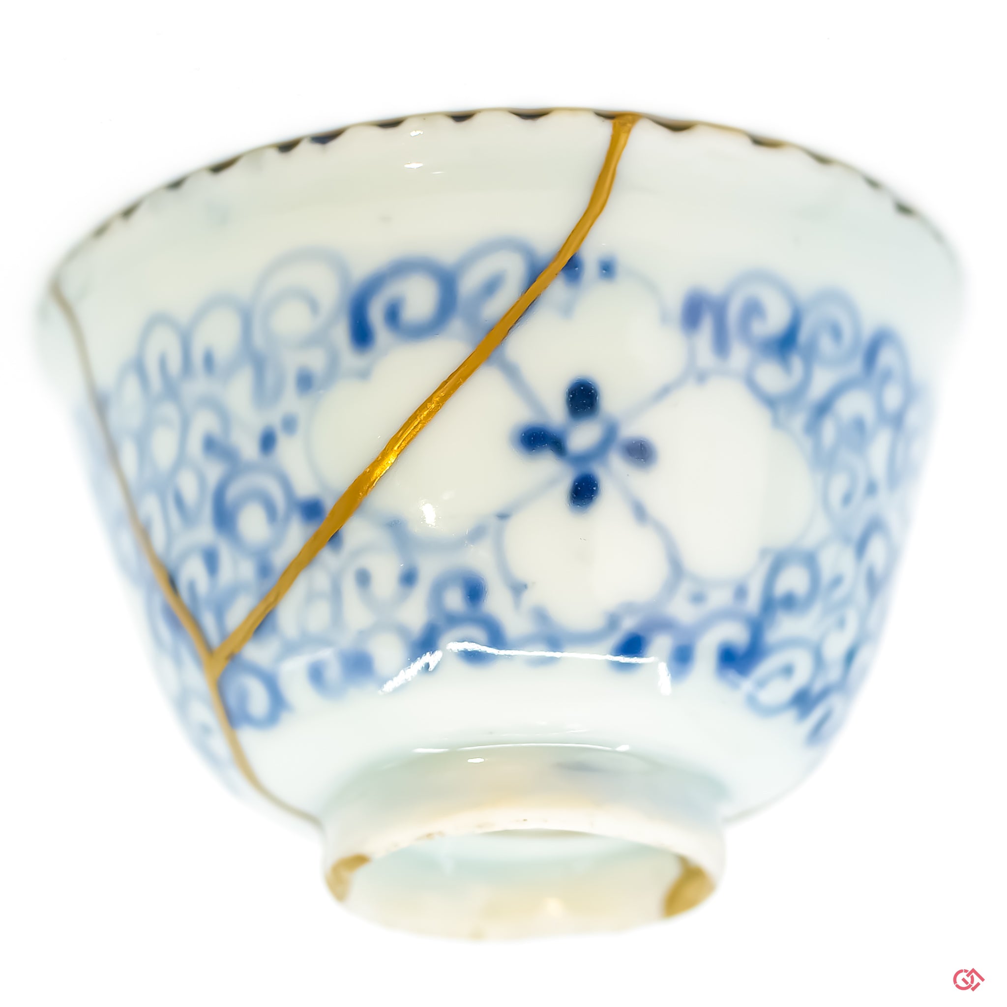 Close up of a kintsugi repaired crack, with clear visual of the gold adhered to the ceramic.