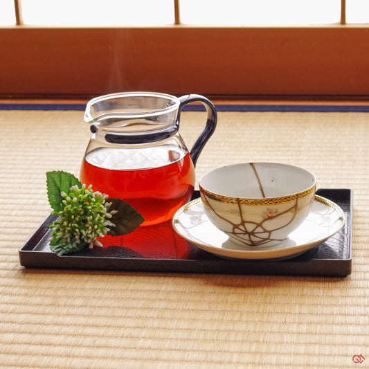 Photo of an authentic Kintsugi pottery piece being used in a real-world setting