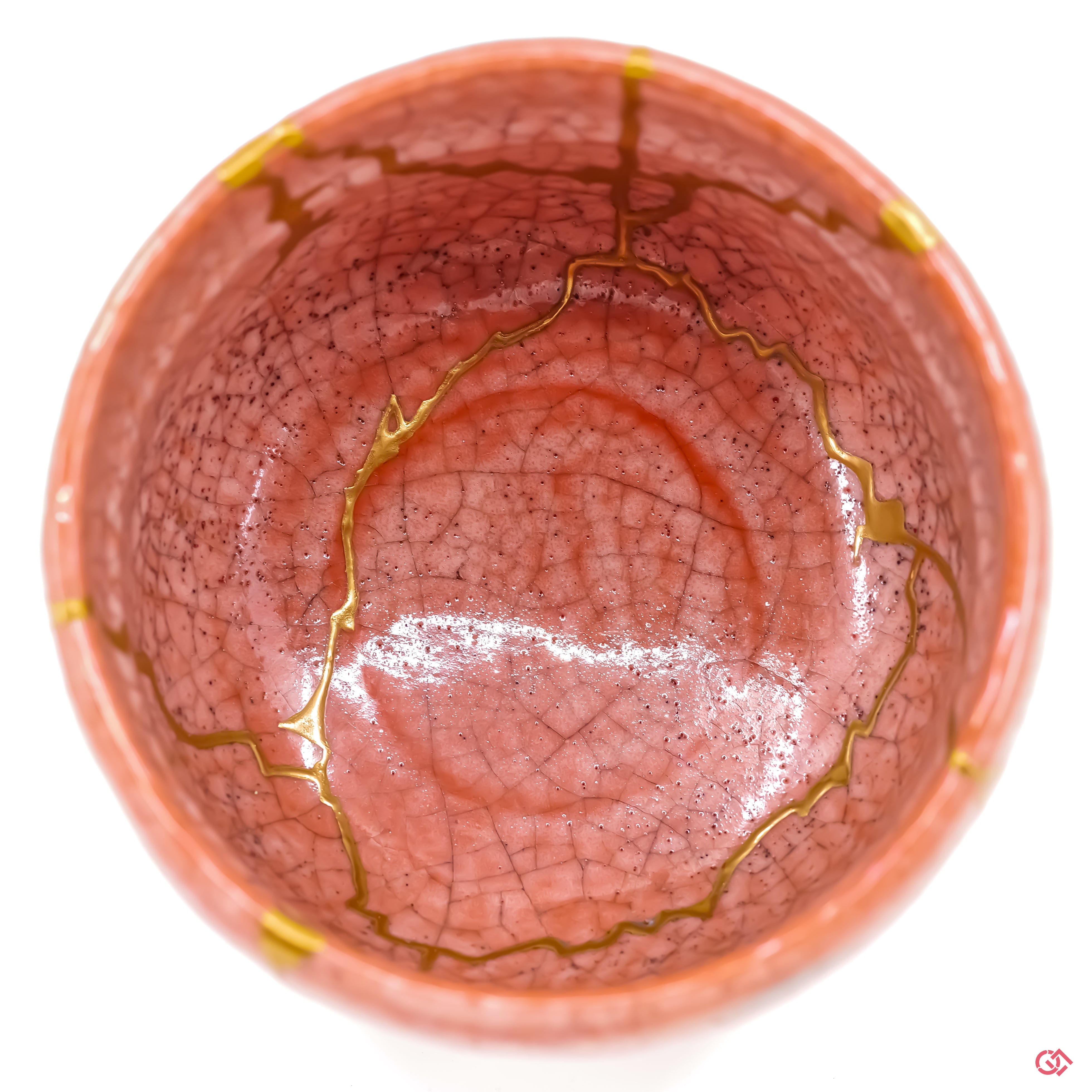 Authentic Kintsugi pottery design: Top view of hand-repaired ceramic piece.