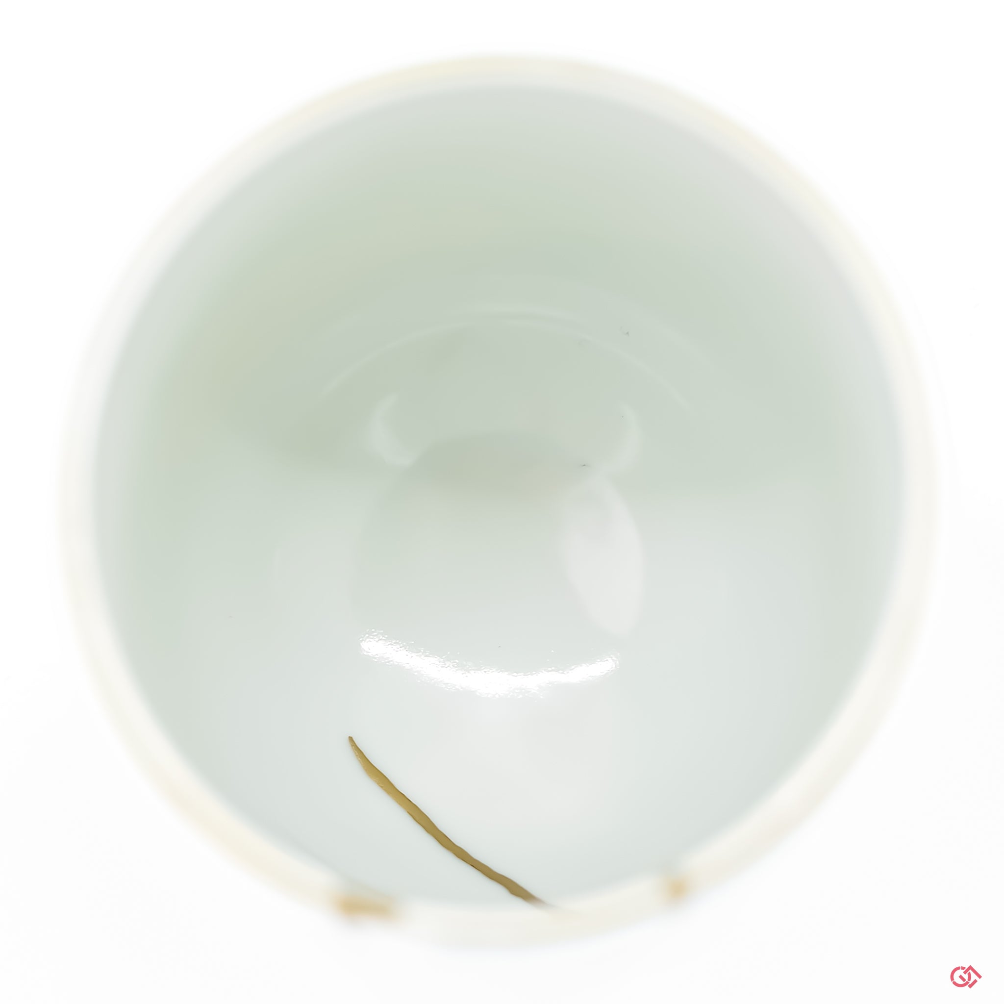 Authentic Kintsugi pottery design: Top view of hand-repaired ceramic piece.