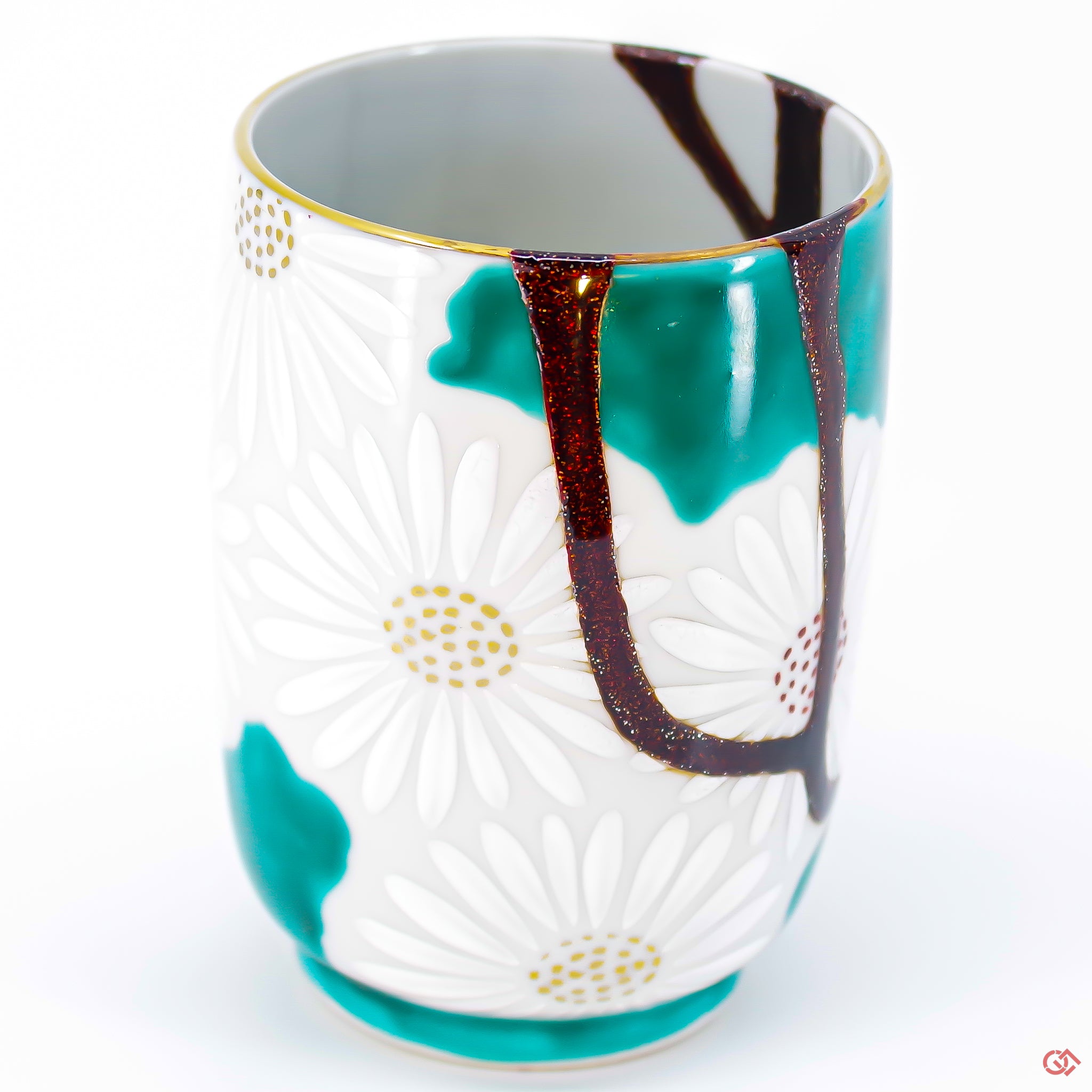 A close-up photo of an authentic Kintsugi pottery piece, showing the detail of its repairs and craftsmanship.
