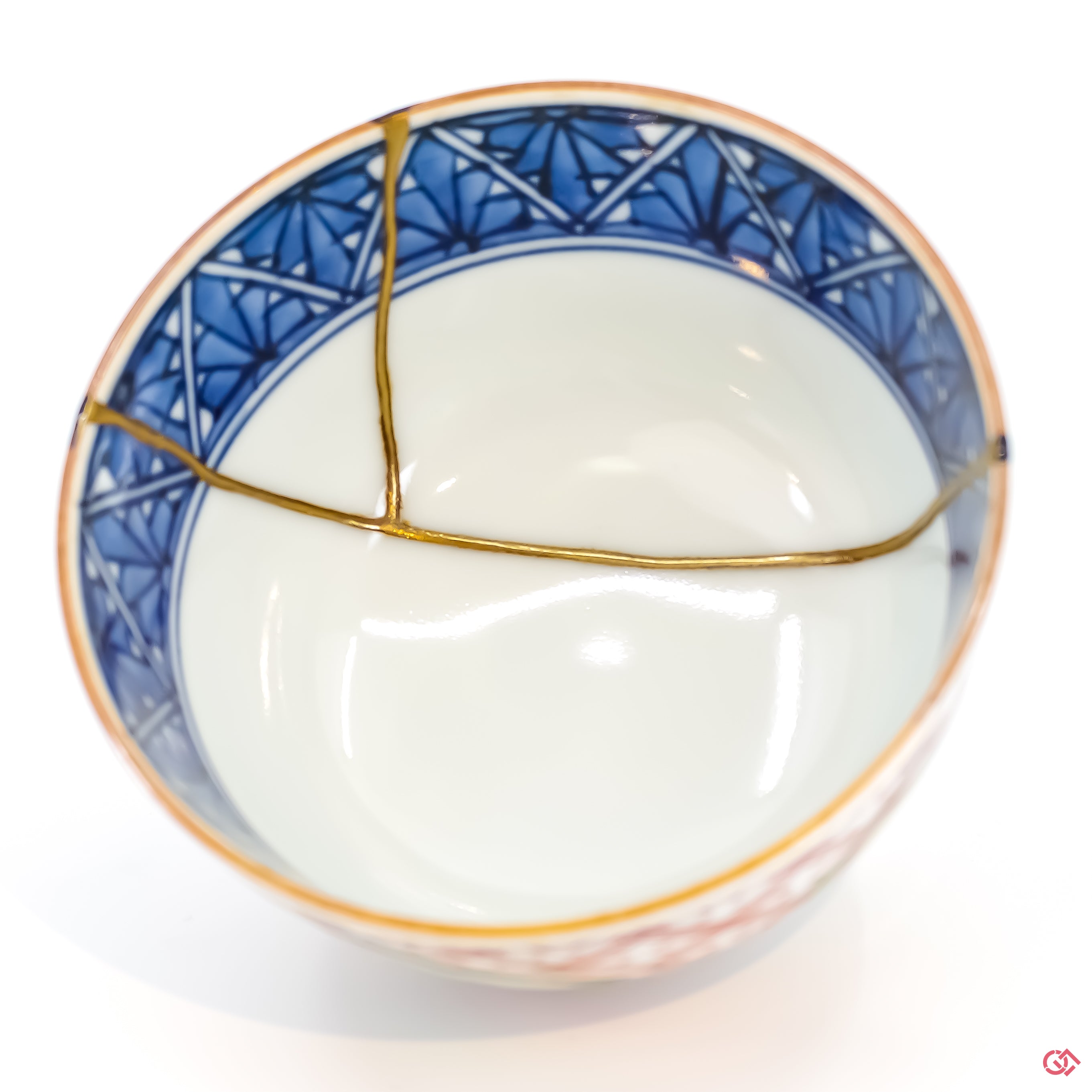 Buy the Japanese art of Kintsugi up close: Witness the delicate brushstrokes of gold that transform imperfection into beauty.