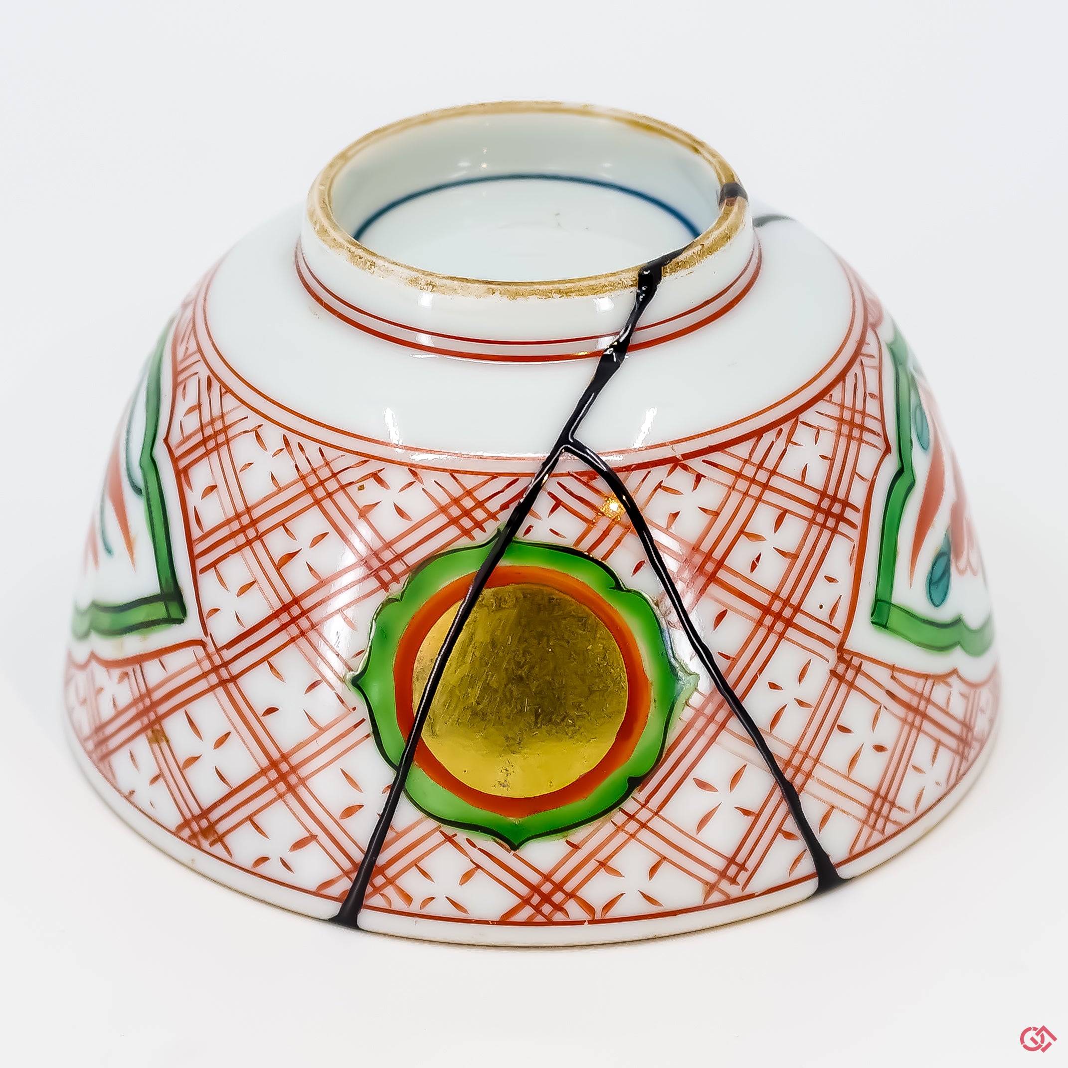 Buy the Japanese art of Kintsugi up close: Witness the delicate brushstrokes of gold that transform imperfection into beauty.