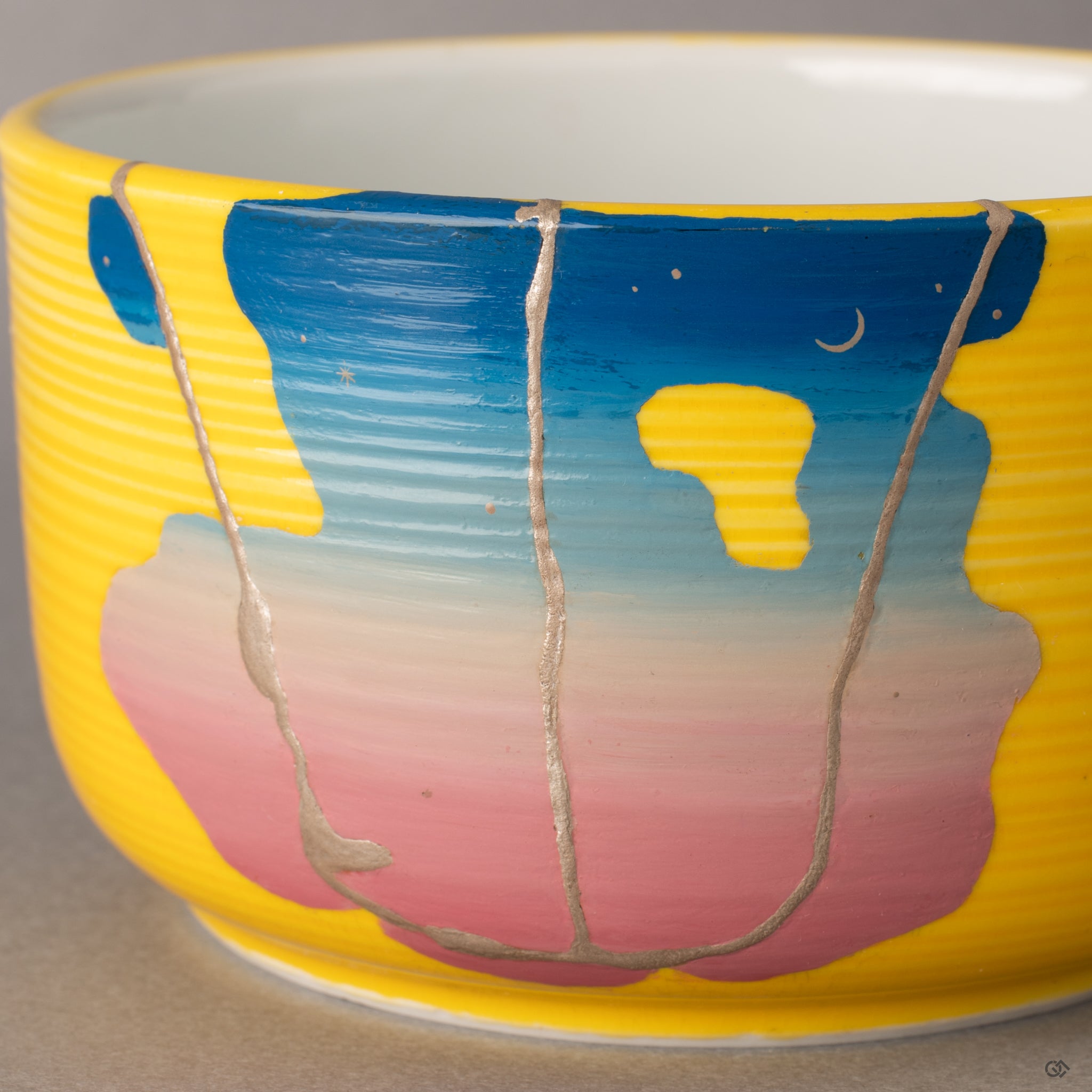 The robust profile of this Kyoto vessel features kintsugi lines blending silver and color, embracing the wabi-sabi philosophy.