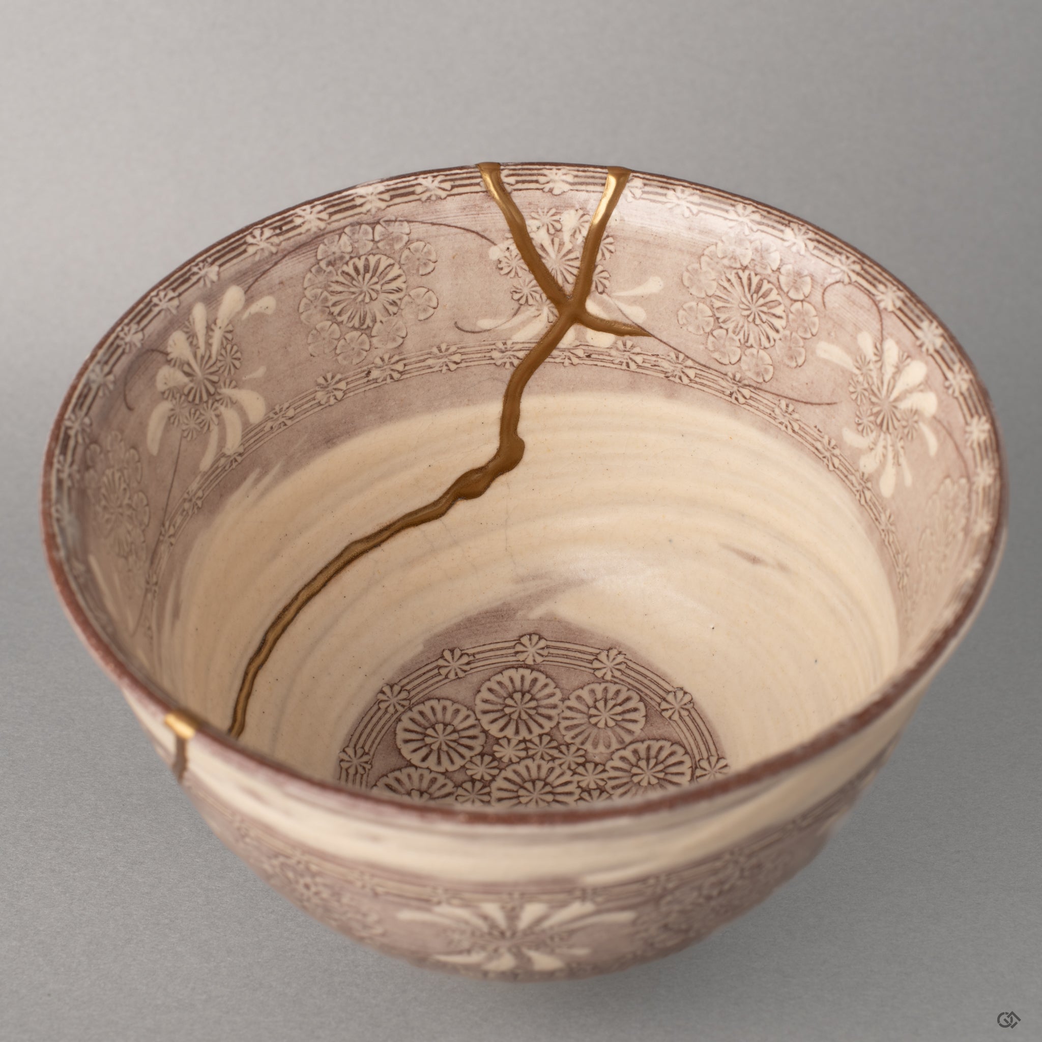 Inside this Kyoto bowl, purple glaze meets urushi lacquer where kintsugi seams gather light, a living philosophy held in stillness.