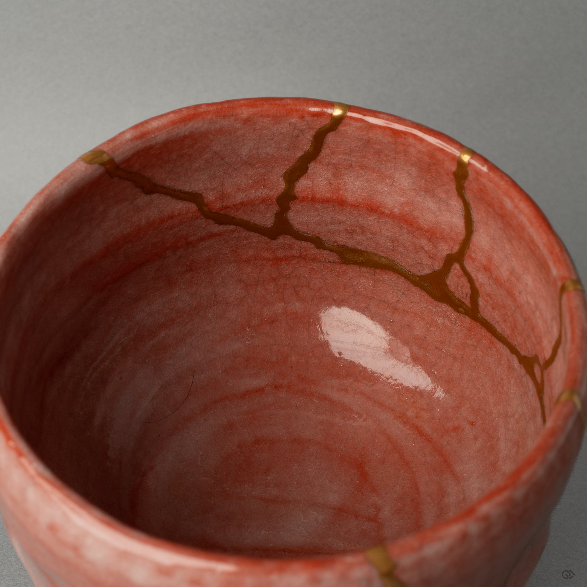 A close view of the story in every seam, where 24k gold kintsugi charts the bowl's path from broken to beautiful.