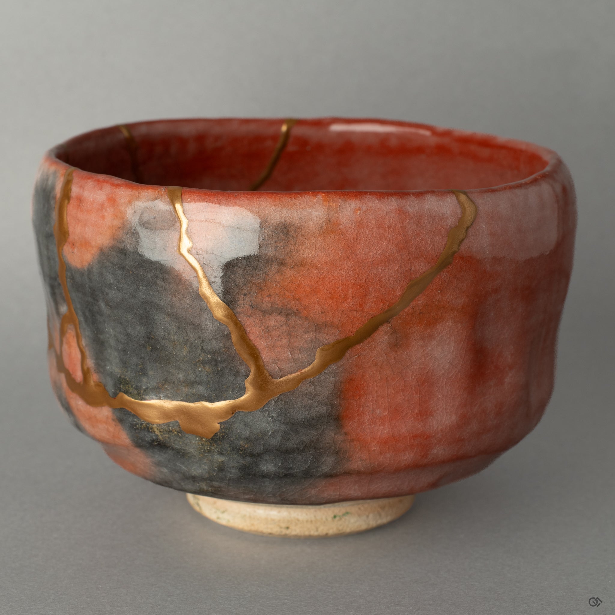 Side view of the golden kintsugi seam on this matcha bowl, a testament to crafted resilience and the art of mending.