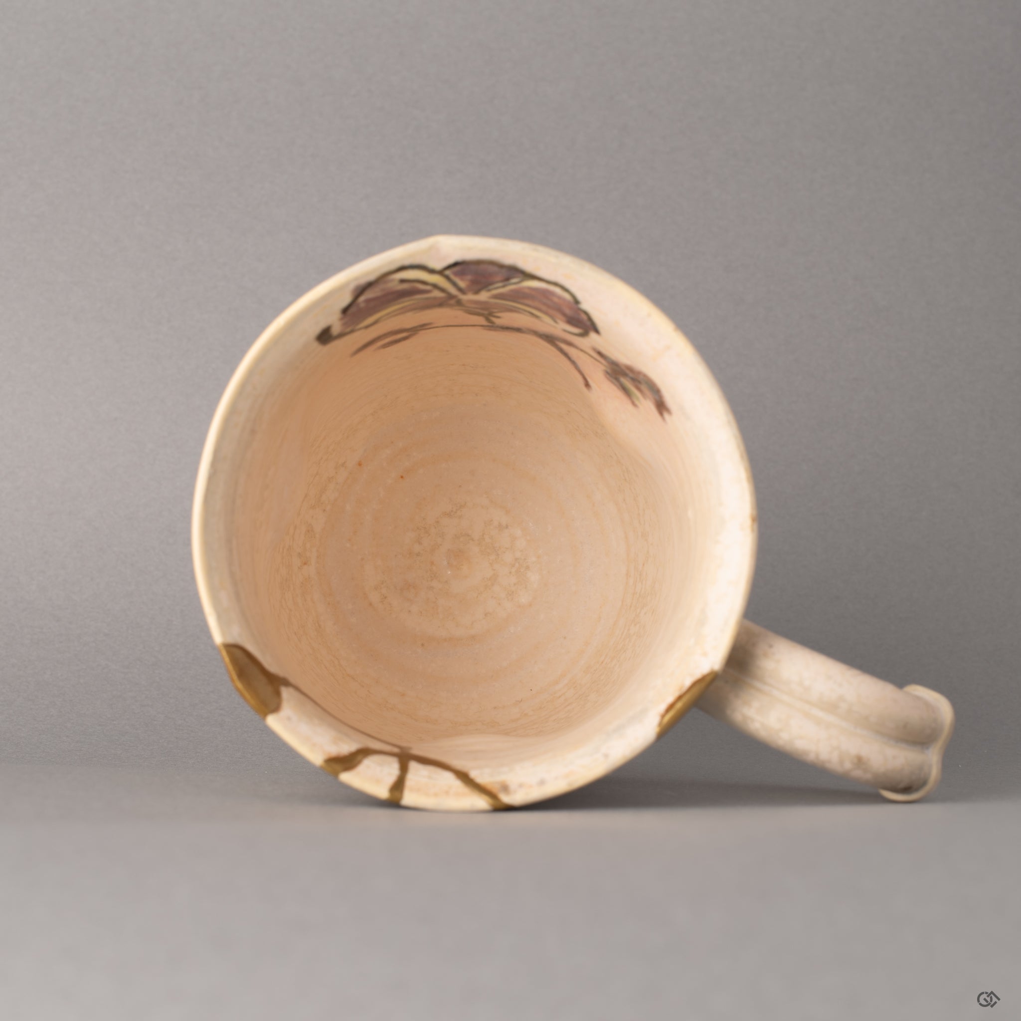 Seen from above, the rim of this Kyoto mug reveals kintsugi lines descending inward, a quiet beauty in circular form.