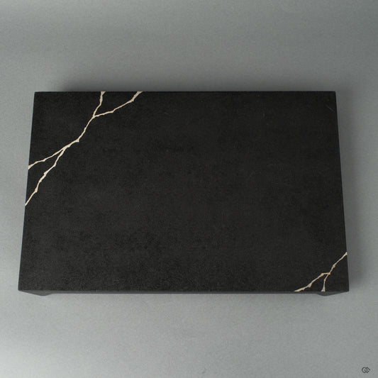 Flat black wooden plate with, fine silver technique, shown from the front view, highlighting Japanese craftsmanship and wabi-sabi elegance