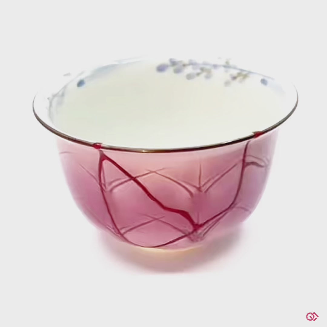 Embrace the beauty of brokenness: This rotating video of an authentic Kintsugi pottery invites you to discover the captivating elegance of flaws transformed into art.