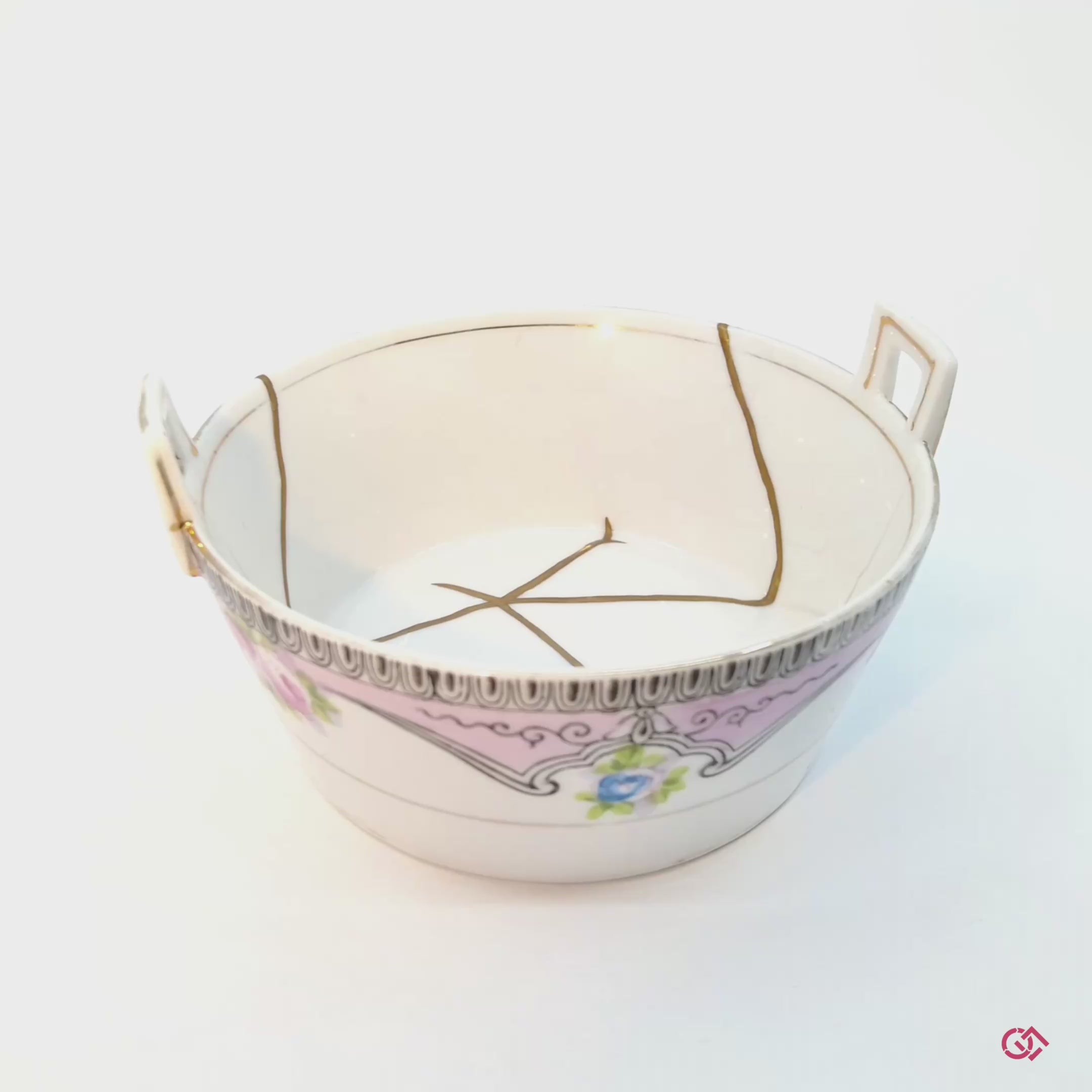 Witness the transformation: Rotating video of broken pottery reborn through authentic kintsugi technique.