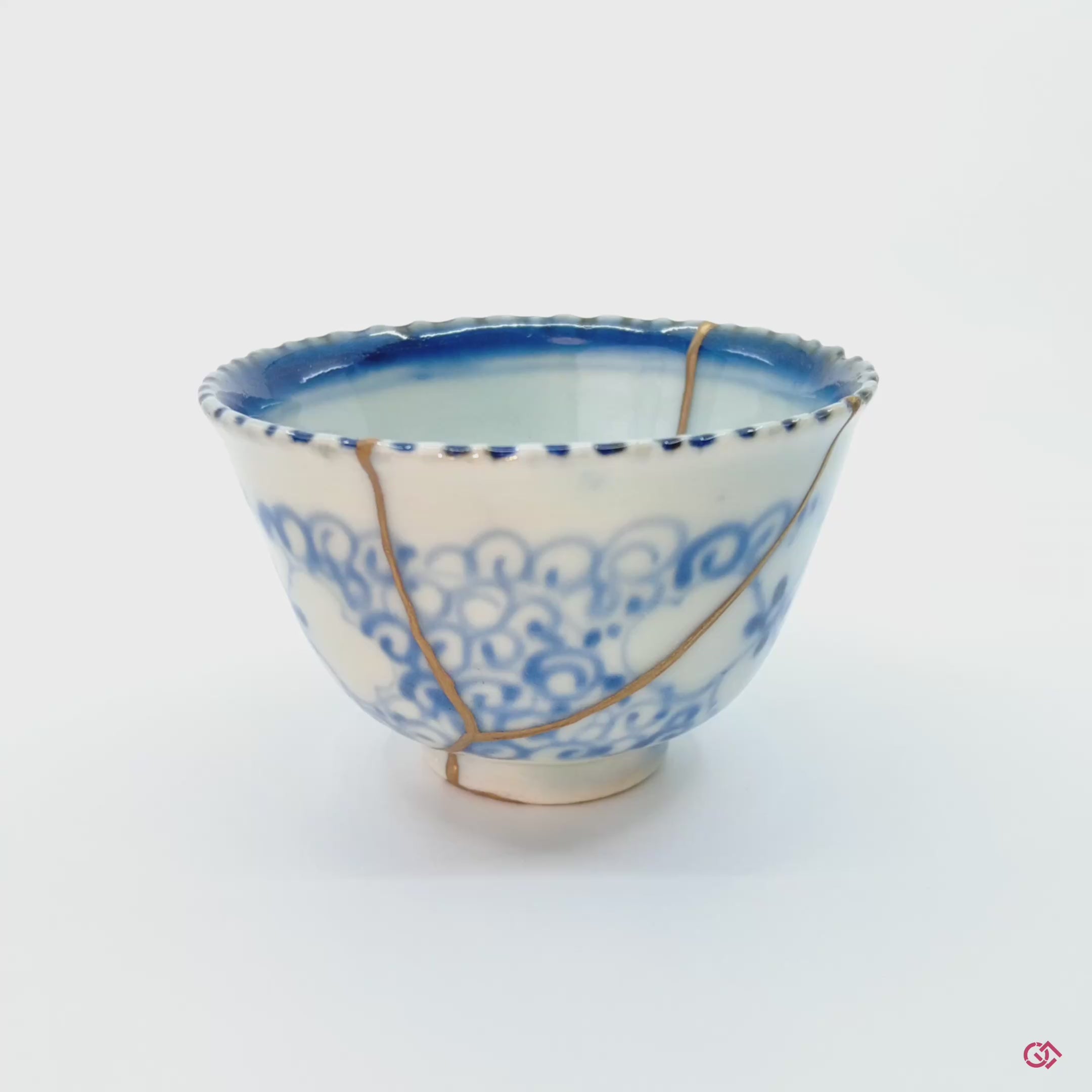 Embrace the beauty of brokenness: This rotating video of an authentic Kintsugi pottery invites you to discover the captivating elegance of flaws transformed into art.