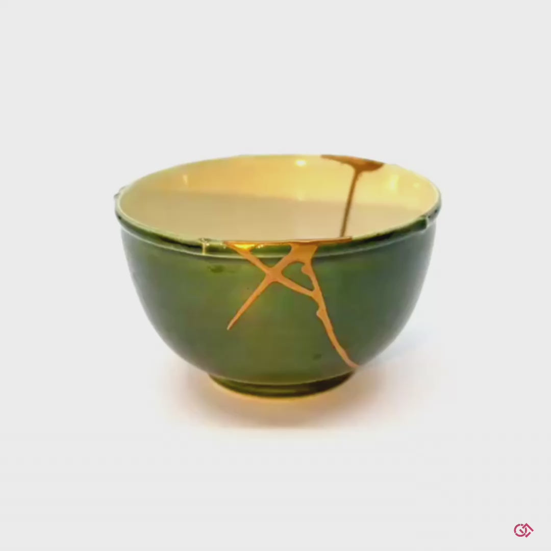 Embrace the beauty of brokenness: This rotating video of an authentic Kintsugi pottery invites you to discover the captivating elegance of flaws transformed into art.